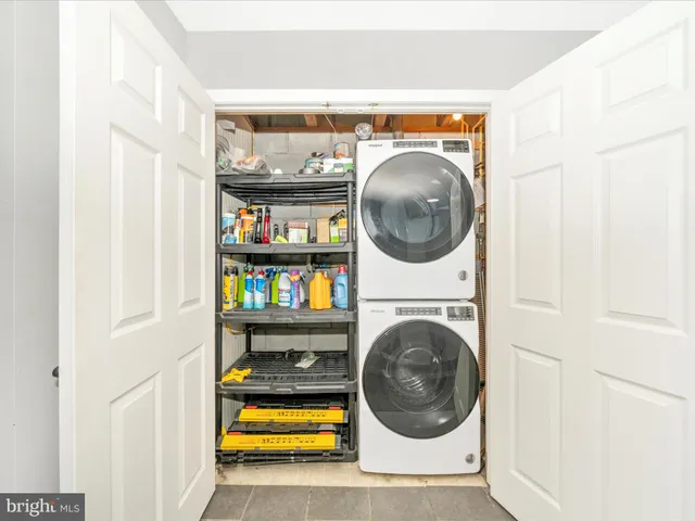 a view of a house with wooden deck