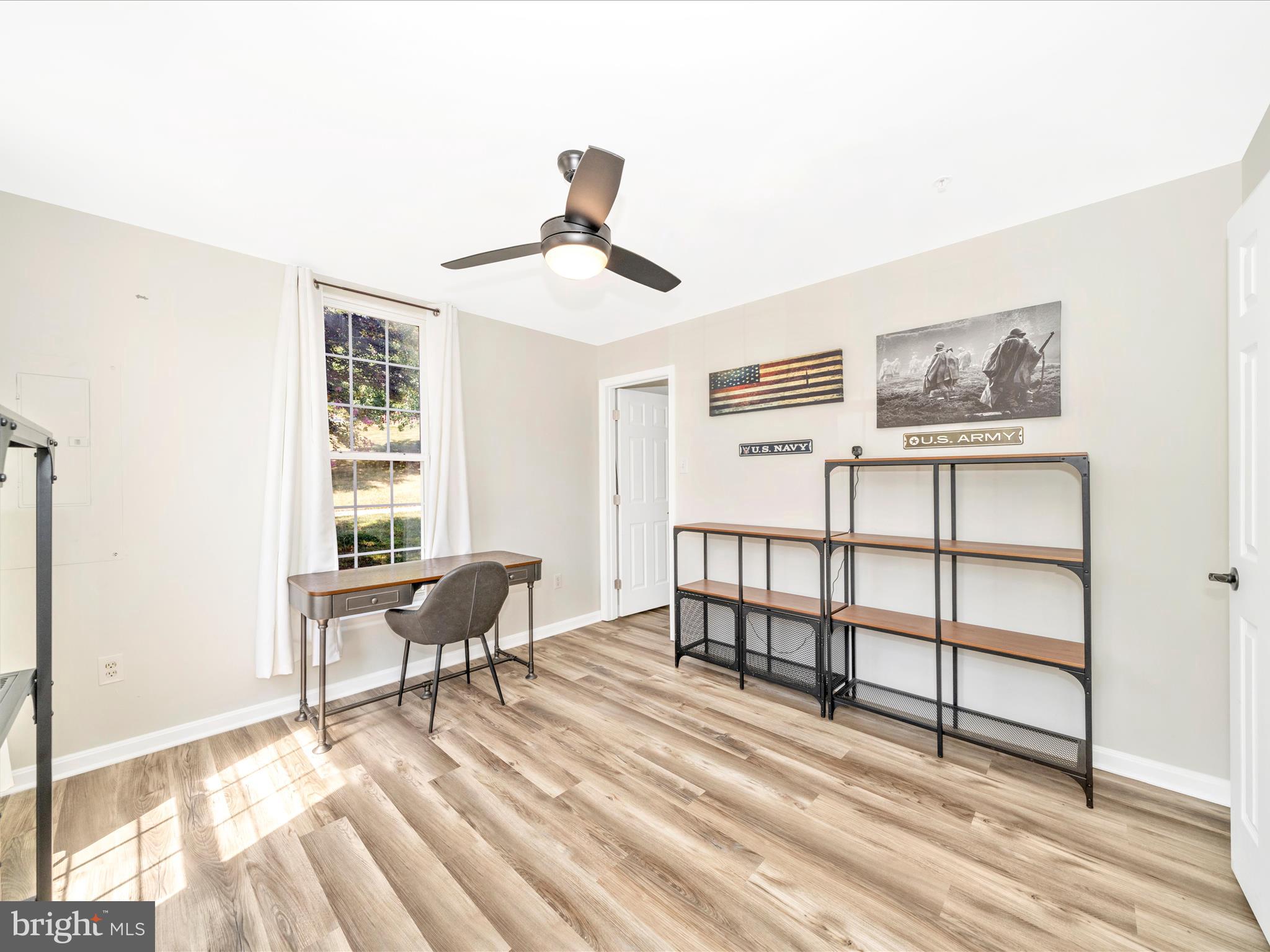 514 Ellison Court Frederick, MD 21703 - Photo 4 of 53 a view of a livingroom with furniture and windows