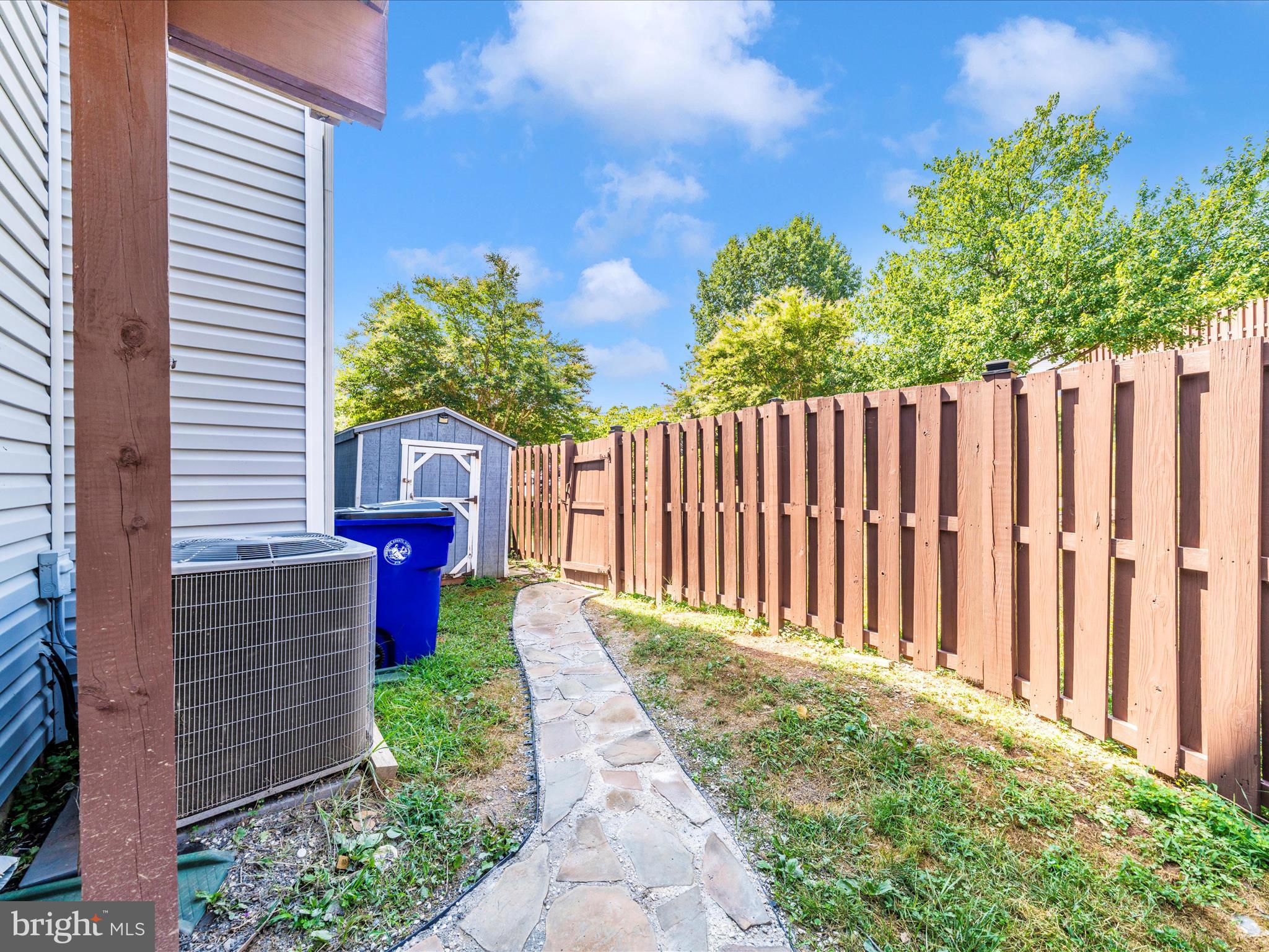 514 Ellison Court Frederick, MD 21703 - Photo 45 of 53 a view of a backyard with wooden fence