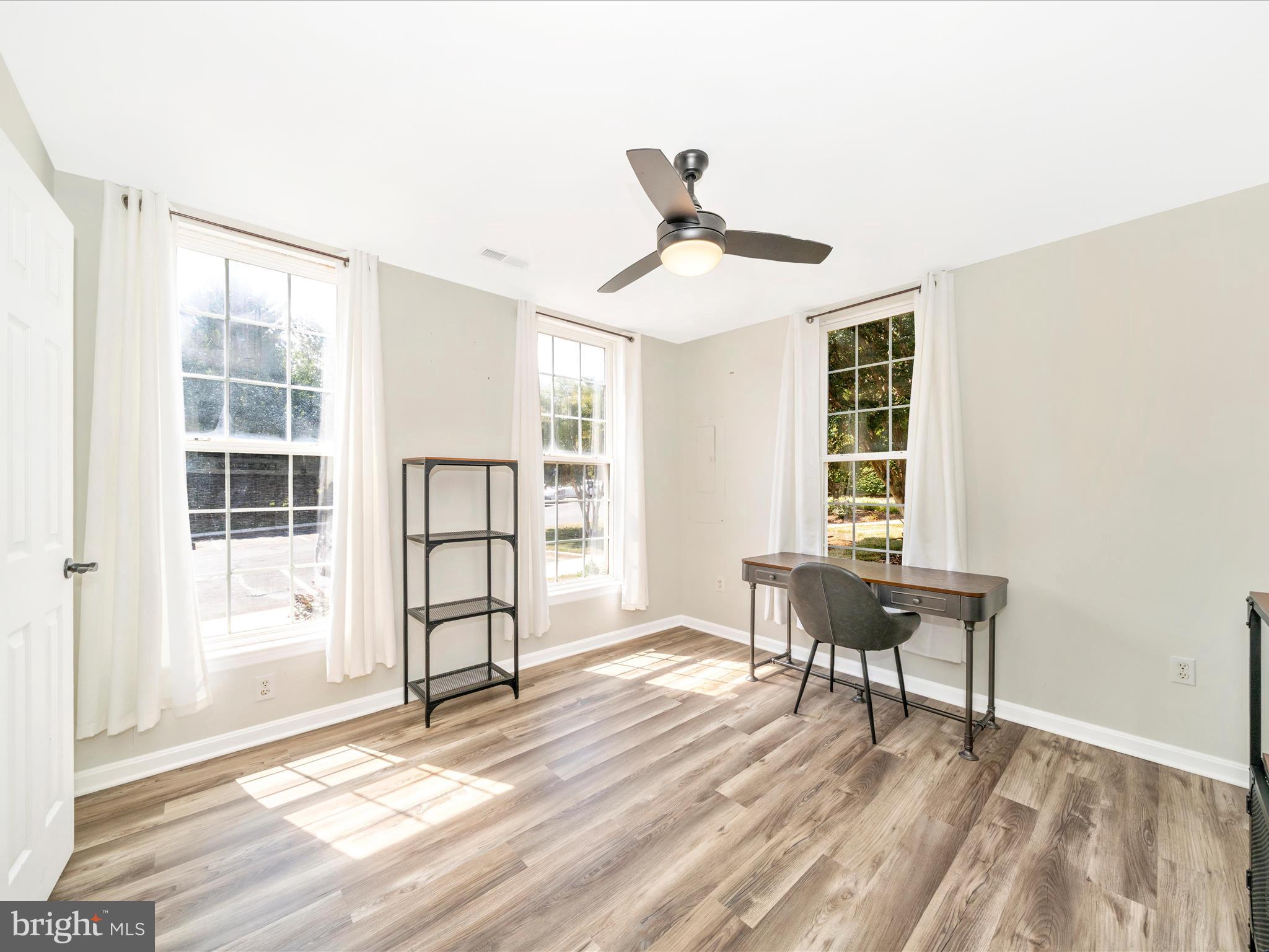 514 Ellison Court Frederick, MD 21703 - Photo 6 of 53 a view of a livingroom with furniture and windows