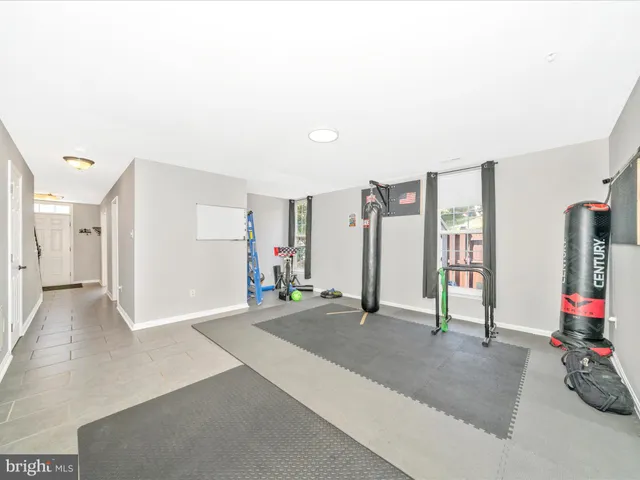 a view of a big room with a windows and cabinet