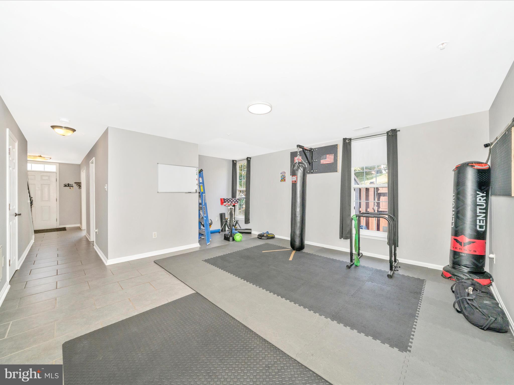 514 Ellison Court Frederick, MD 21703 - Photo 8 of 53 a view of a room with gym equipment