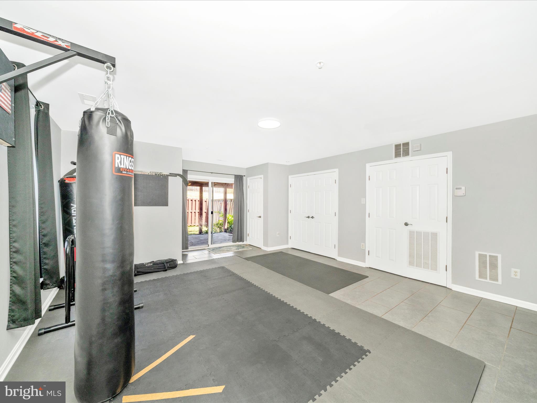 514 Ellison Court Frederick, MD 21703 - Photo 9 of 53 a view of a big room with a windows and cabinet