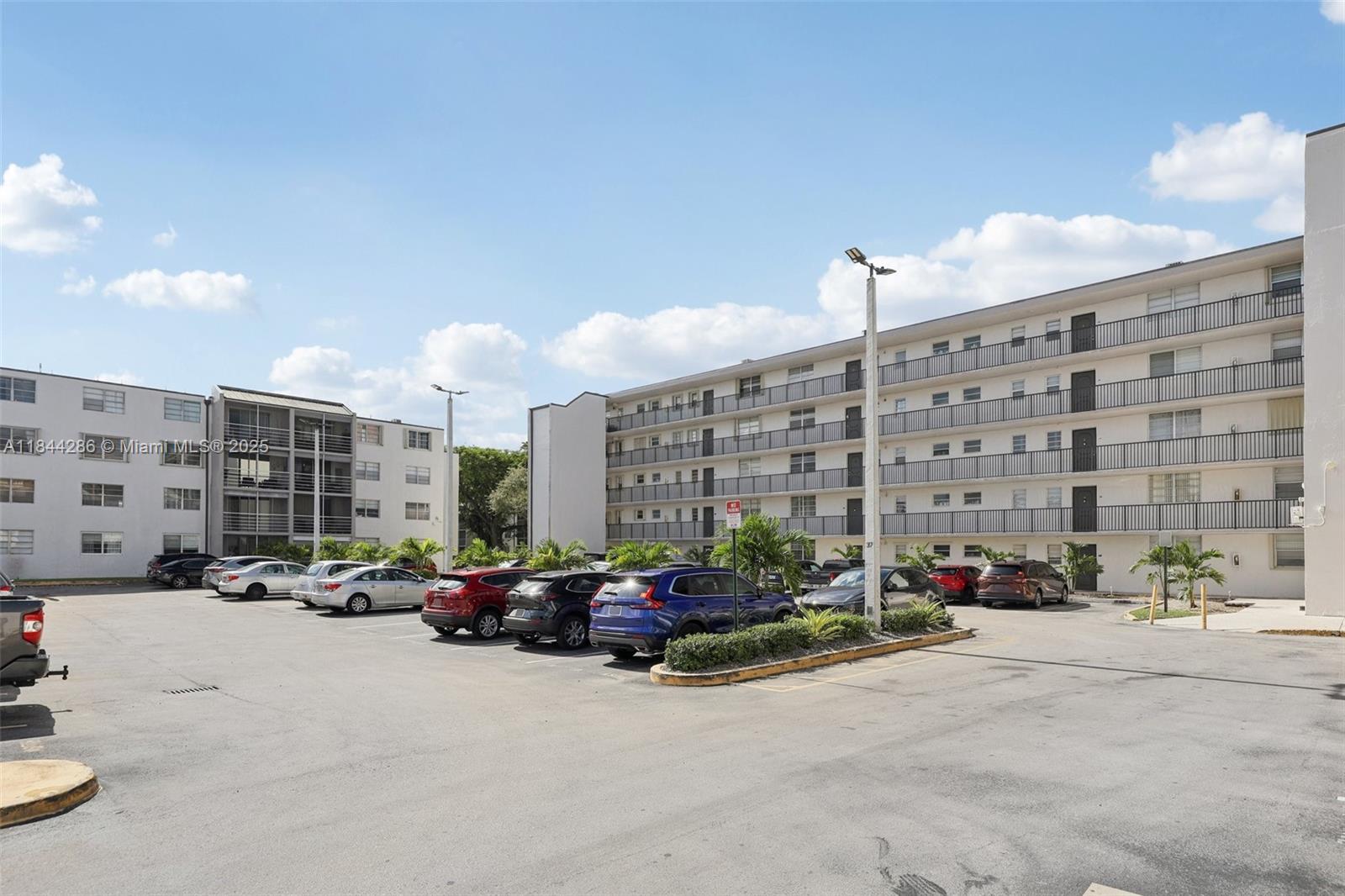a cars parked in front of a building