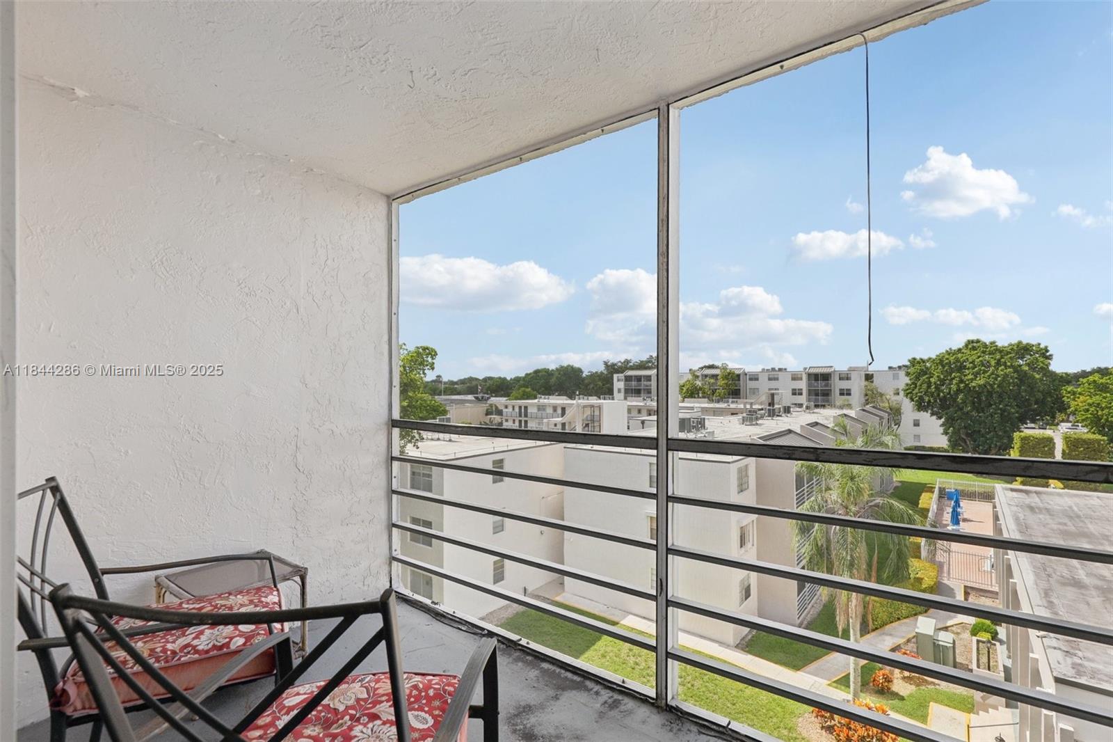 14170 Southwest 84th Street, Unit 501F Miami, FL 33183 - Photo 15 of 26 a view of a city from a balcony