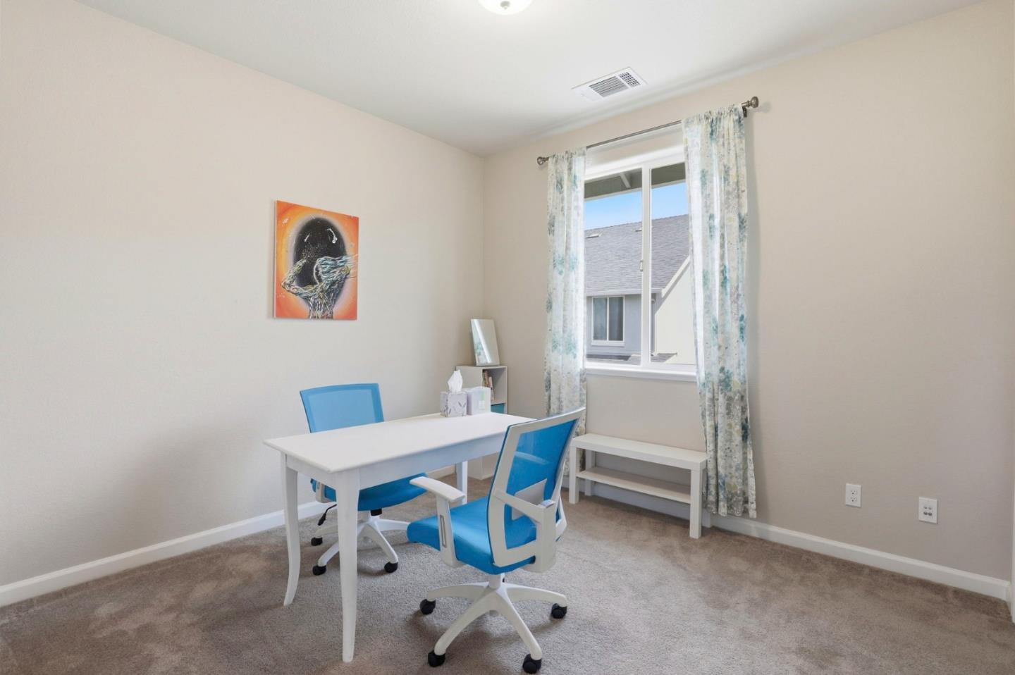187 Springtime Circle Hollister, CA 95023 - Photo 12 of 19 a view of a dining room with furniture and a window