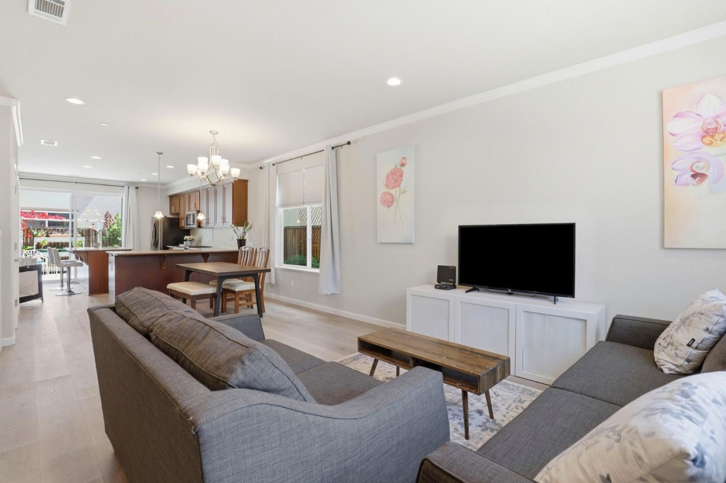187 Springtime Circle Hollister, CA 95023 - Photo 3 of 19 a living room with furniture and a flat screen tv