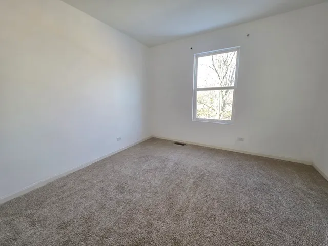 a view of an empty room with window