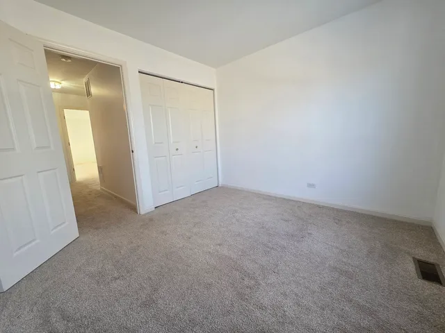 a view of a backyard of the house