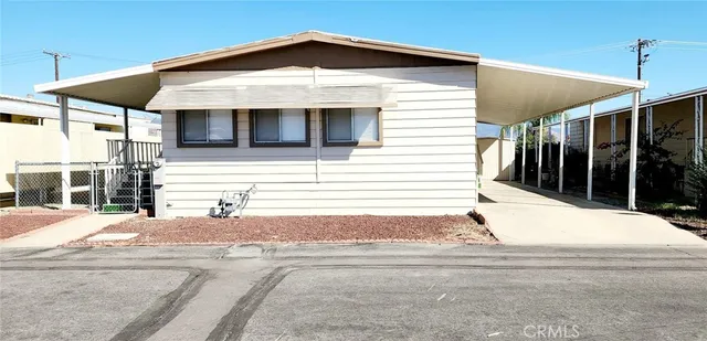 a front view of a house with garage