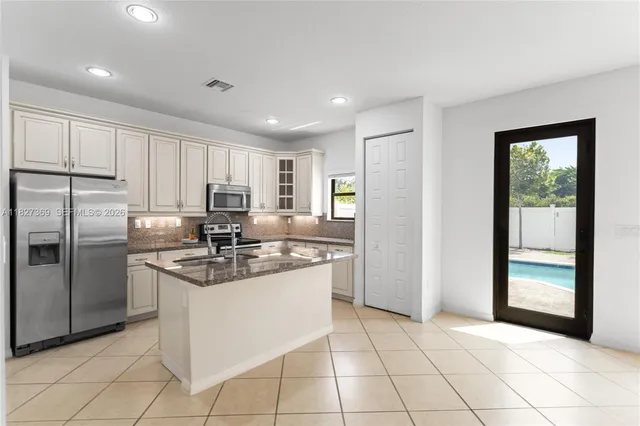 $699,900 | 878 Northeast 191st Street, Miami, FL 33179