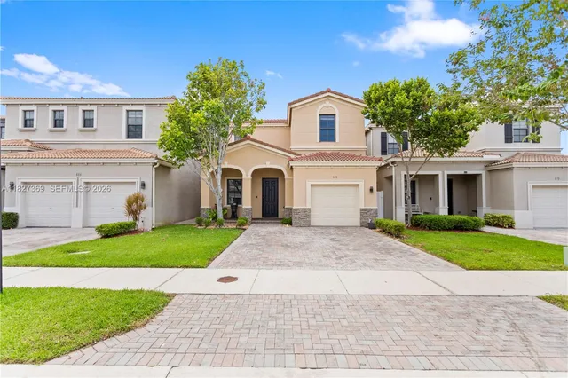$699,900 | 878 Northeast 191st Street, Miami, FL 33179