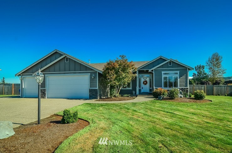 18110 Joseph Drive Southwest Rochester, WA 98579 - Photo 1 of 25 a front view of house with yard and green space