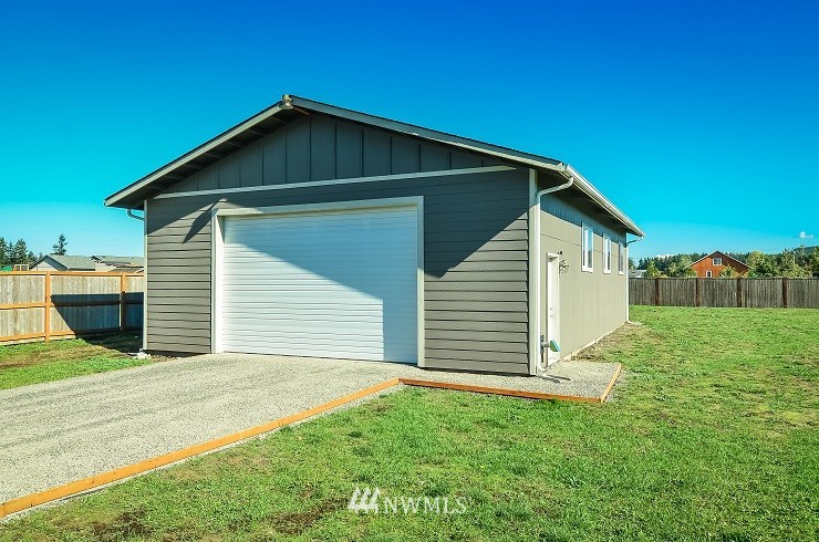18110 Joseph Drive Southwest Rochester, WA 98579 - Photo 2 of 25 a view of a house with yard