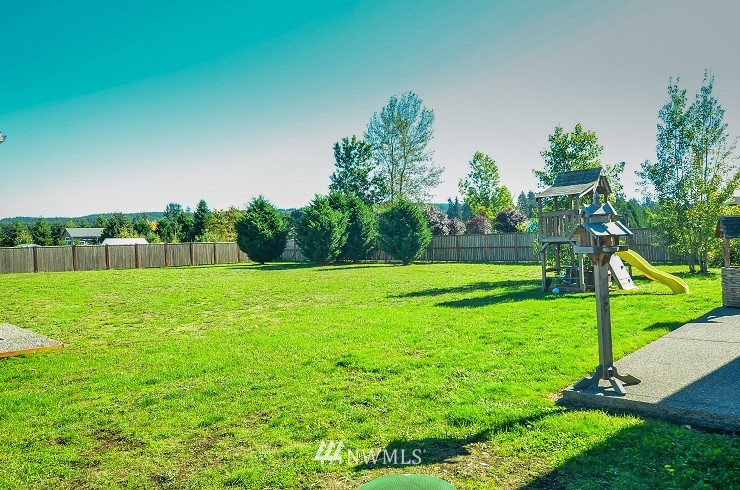 18110 Joseph Drive Southwest Rochester, WA 98579 - Photo 18 of 25 a view of a golf course with a garden