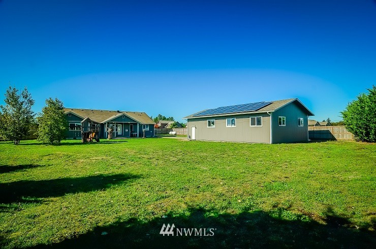18110 Joseph Drive Southwest Rochester, WA 98579 - Photo 19 of 25 a view of a house with a big yard