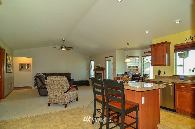 18110 Joseph Drive Southwest Rochester, WA 98579 - Photo 7 of 25 a living room with furniture and wooden floor