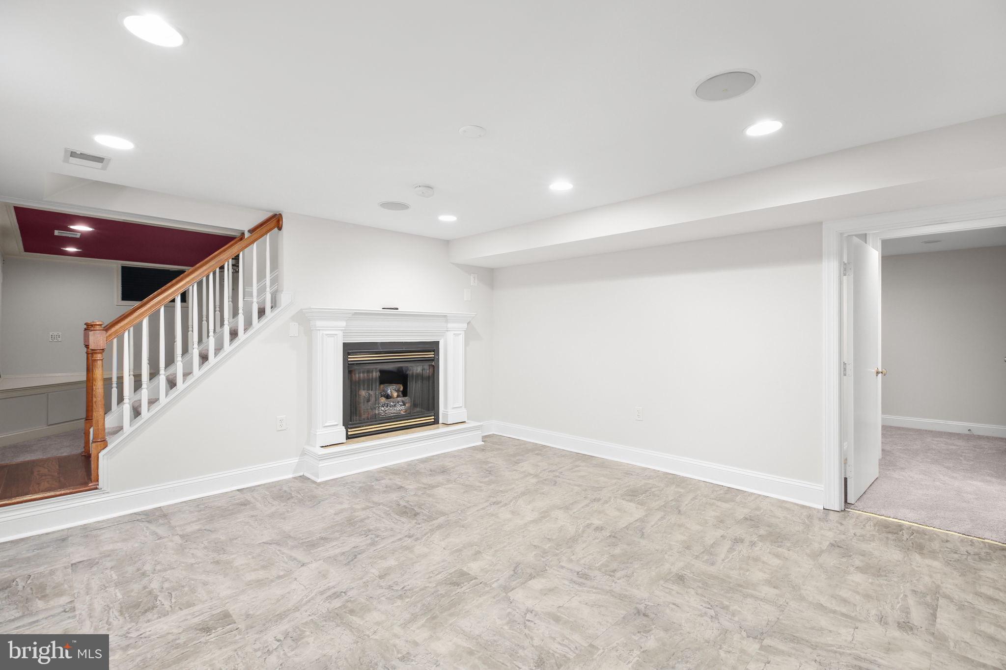 9416 Marye Road Partlow, VA 22534 - Photo 15 of 31 Spacious, versatile basement with fireplace charm.
