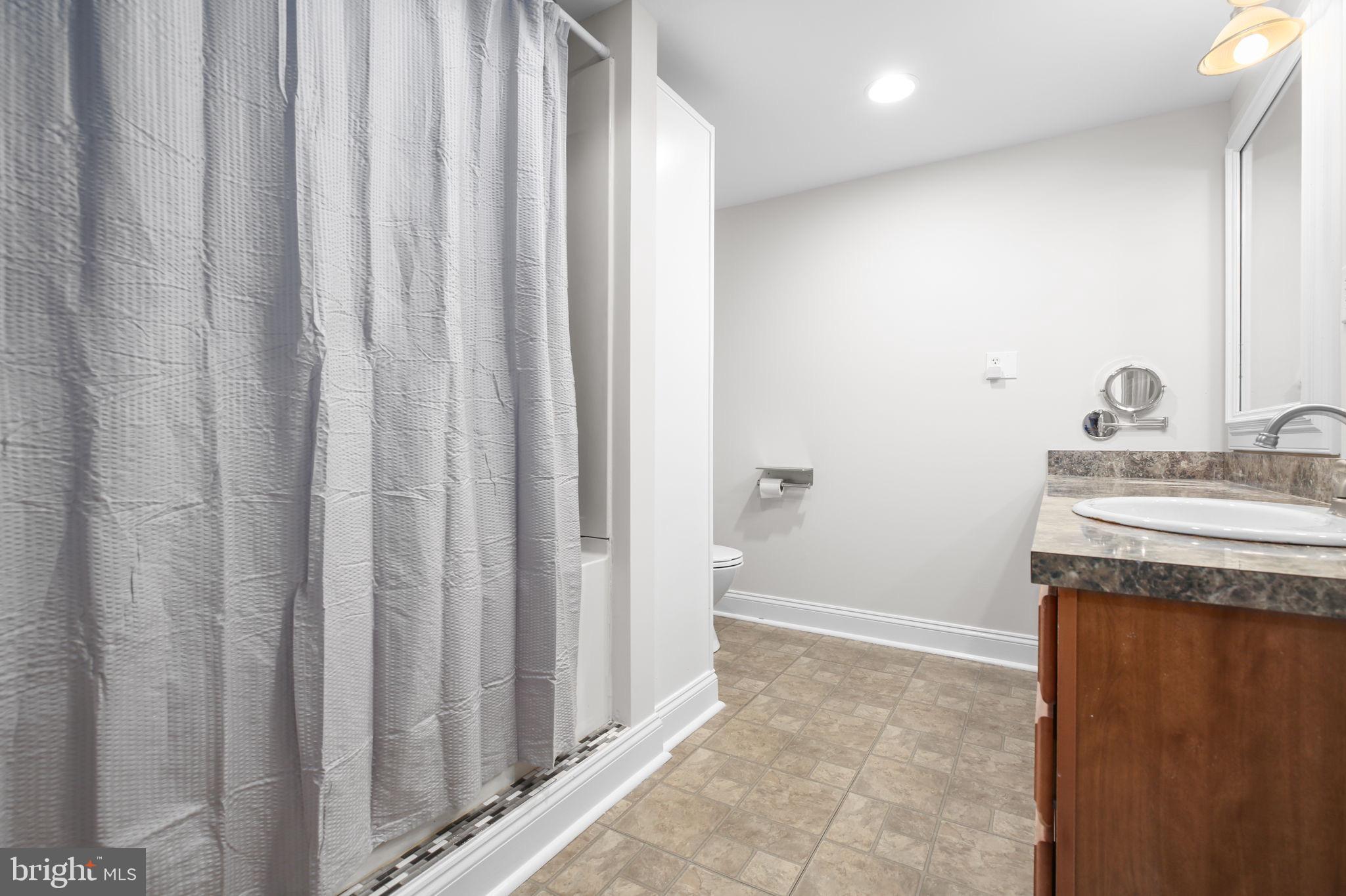 9416 Marye Road Partlow, VA 22534 - Photo 19 of 31 Modern bathroom with sleek finishes.