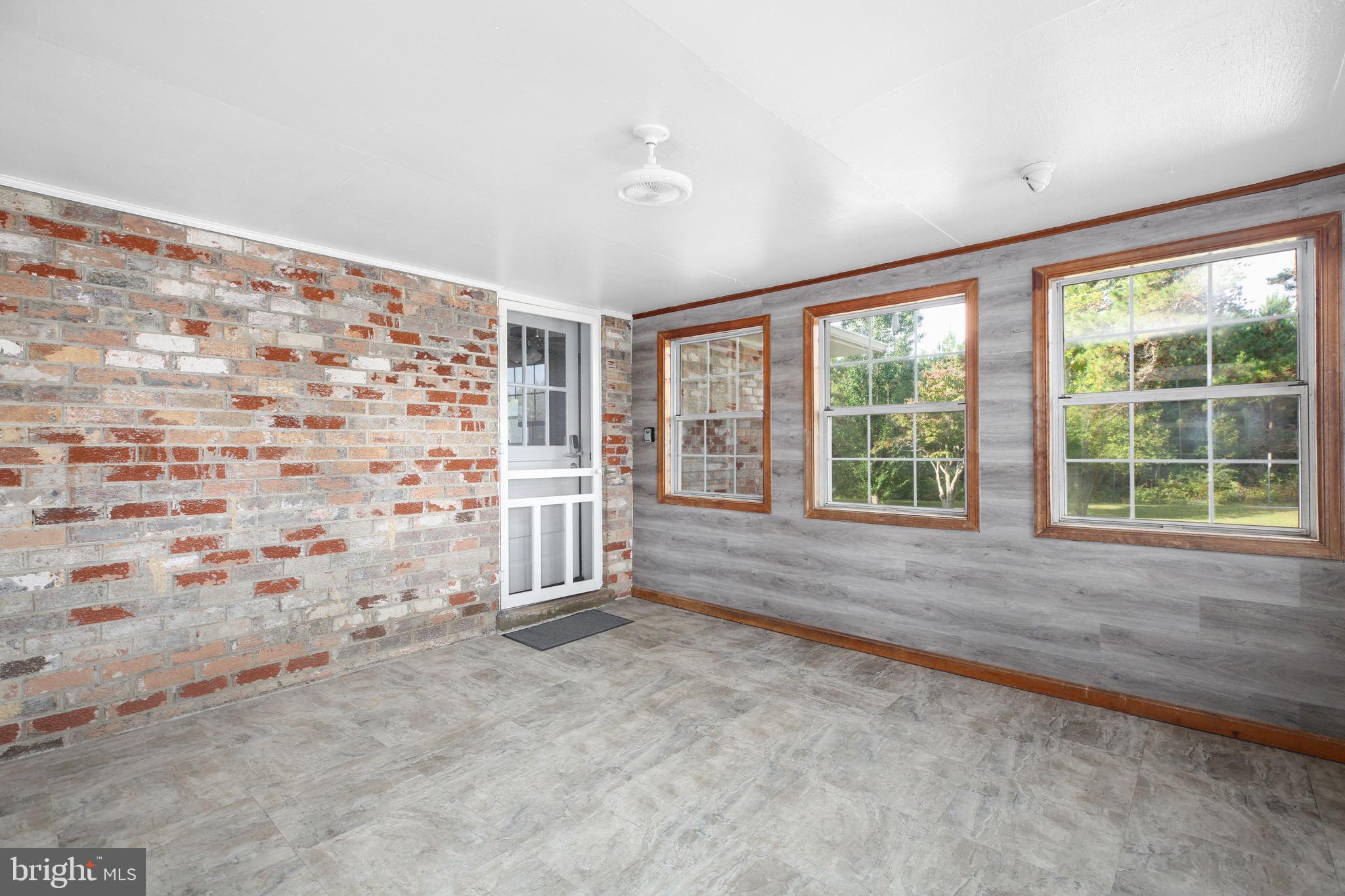 9416 Marye Road Partlow, VA 22534 - Photo 23 of 31 Bright and airy sunroom with rustic charm.