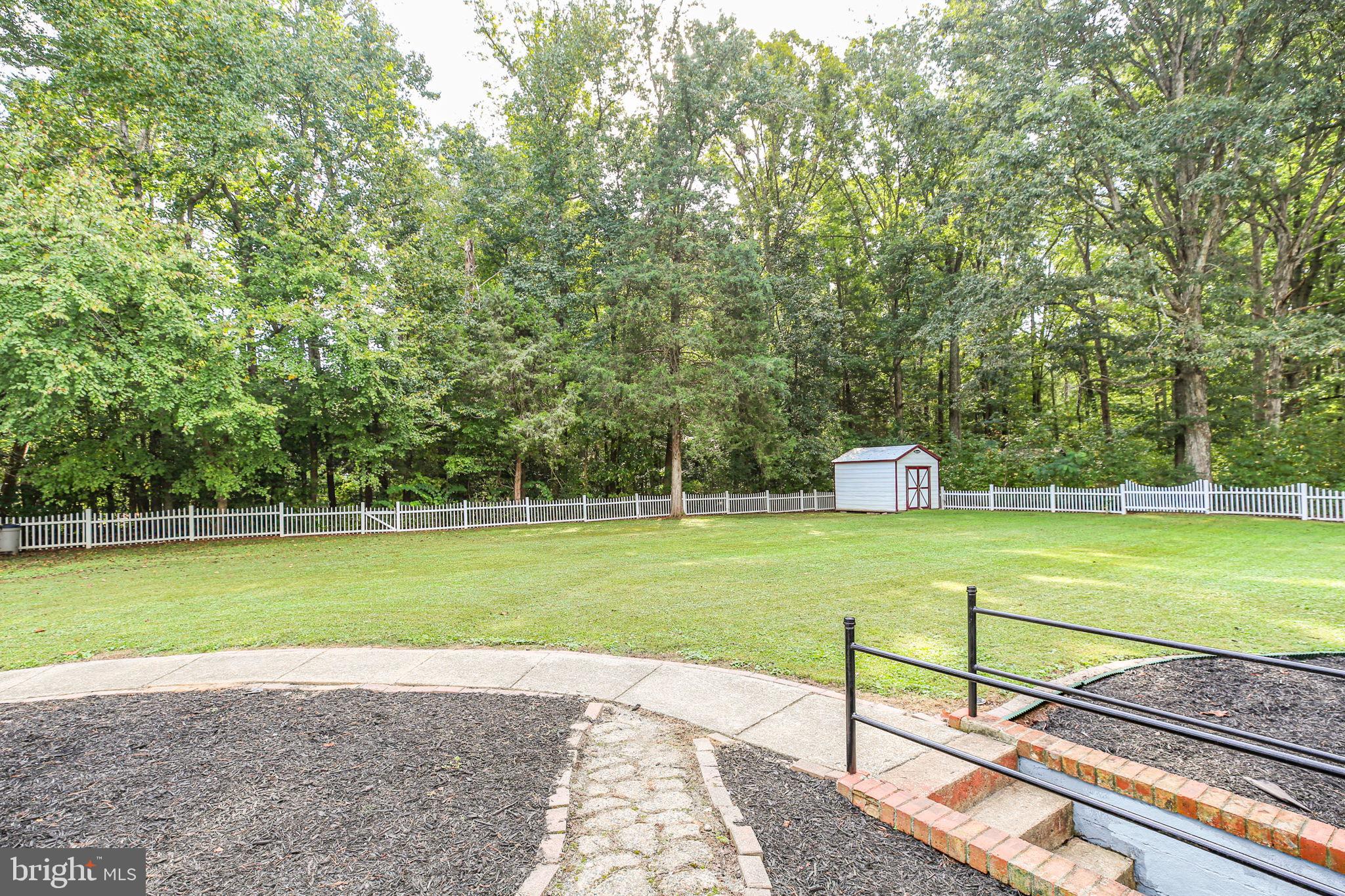 9416 Marye Road Partlow, VA 22534 - Photo 27 of 31 Spacious yard embraced by lush greenery.