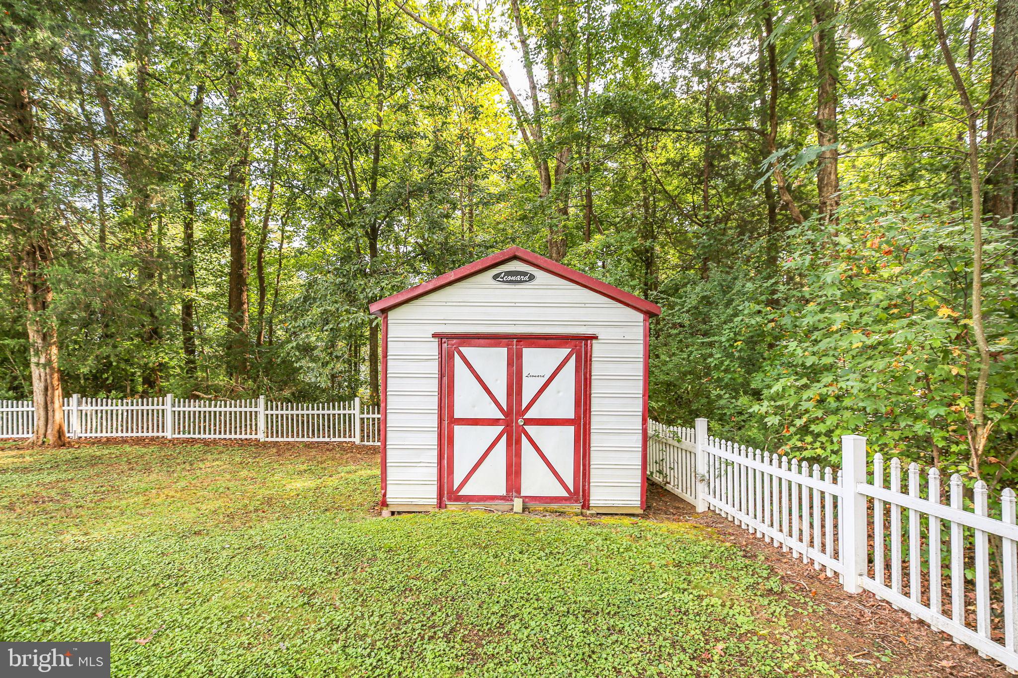 9416 Marye Road Partlow, VA 22534 - Photo 28 of 31 Charming shed nestled in a serene woodland.