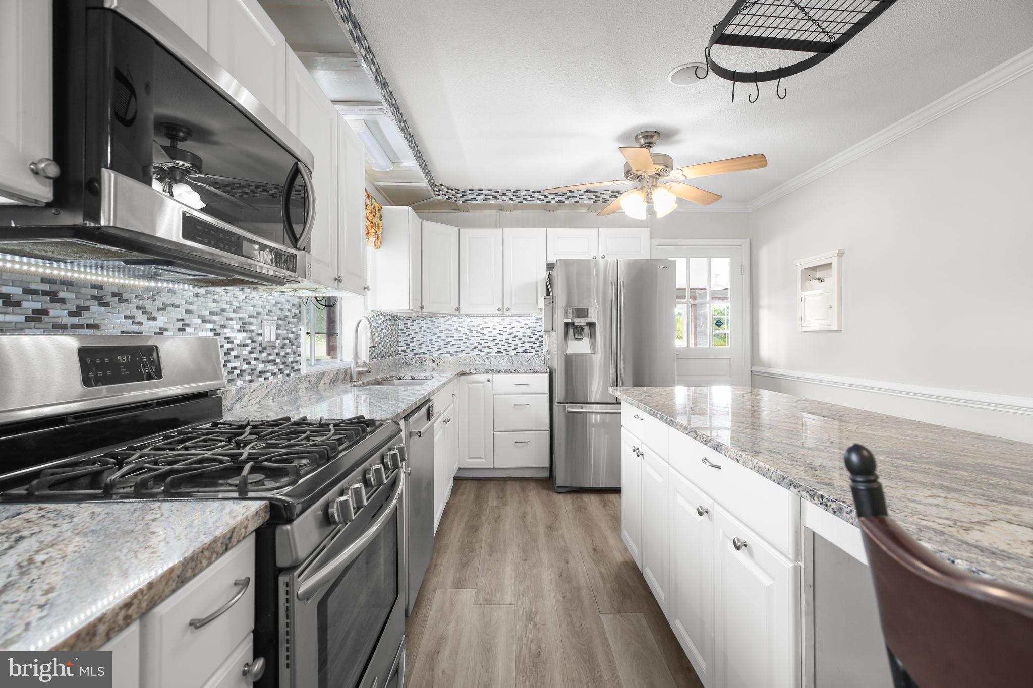 9416 Marye Road Partlow, VA 22534 - Photo 5 of 31 Modern kitchen with sleek finishes.