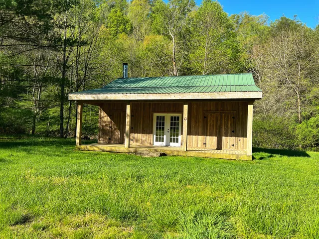 a view of a road with lots of trees