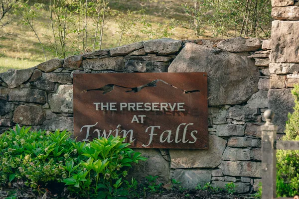 a signage on a brick wall
