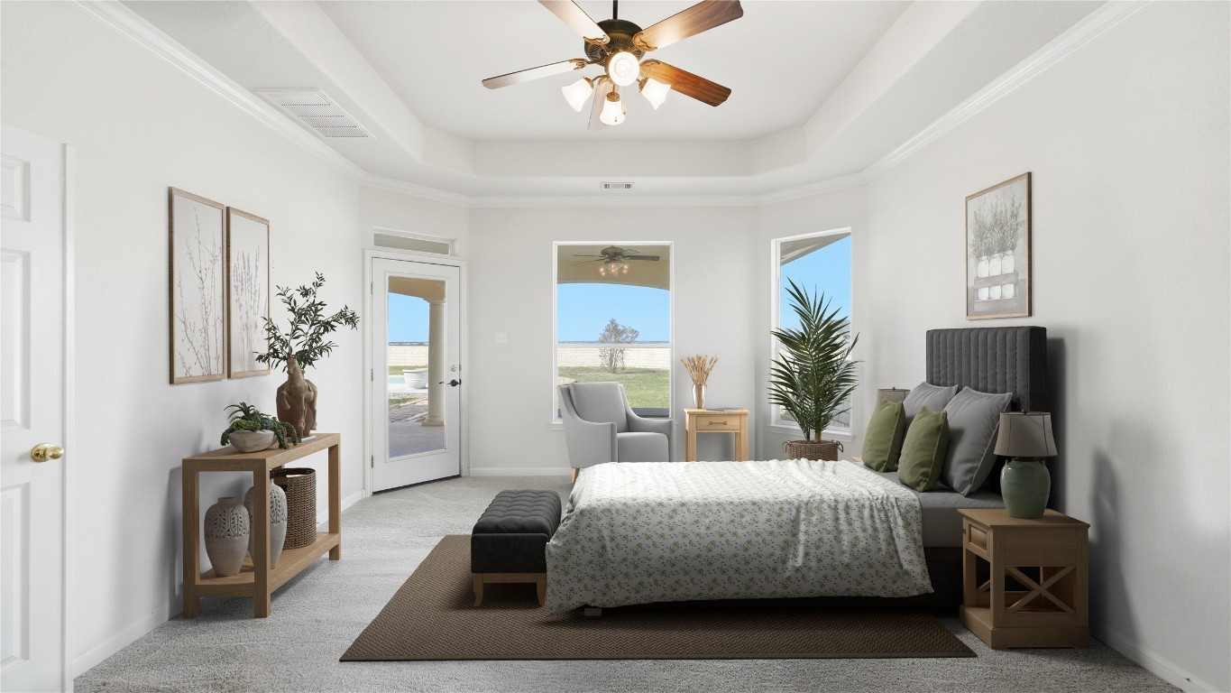 15620 Harry Lind Road Manor, TX 78653 - Photo 15 of 40 a bedroom with a bed a chandelier and mirror