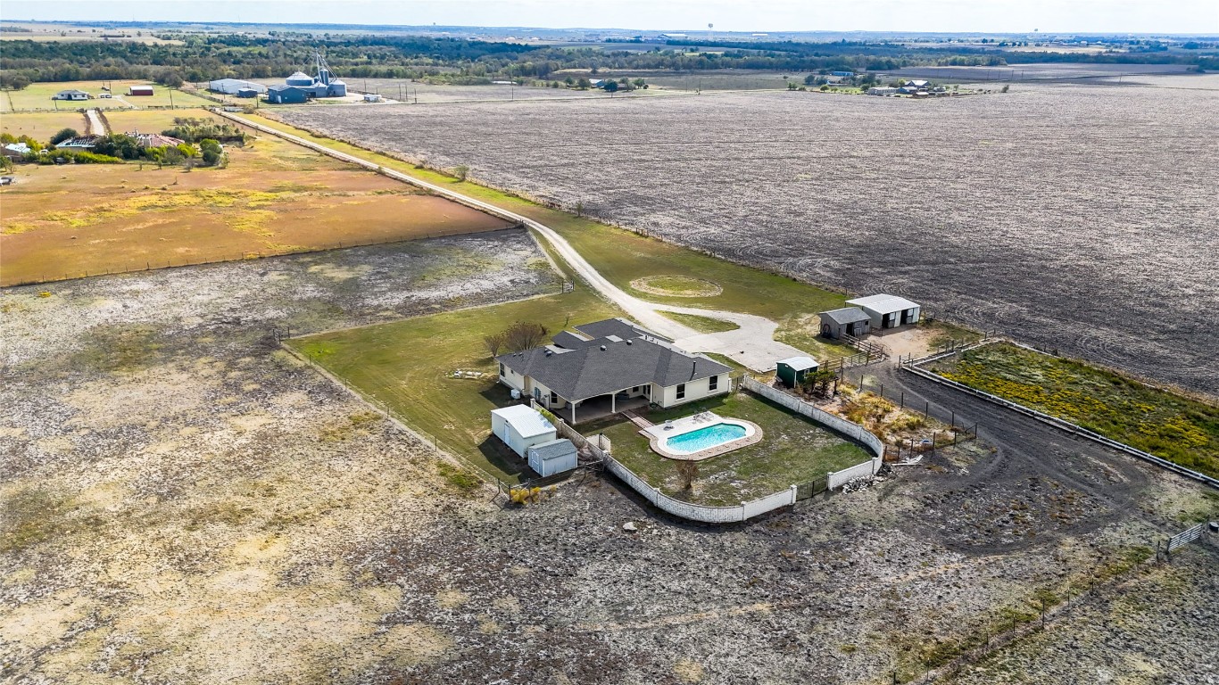 15620 Harry Lind Road Manor, TX 78653 - Photo 4 of 40 swimming pool view with a lake view