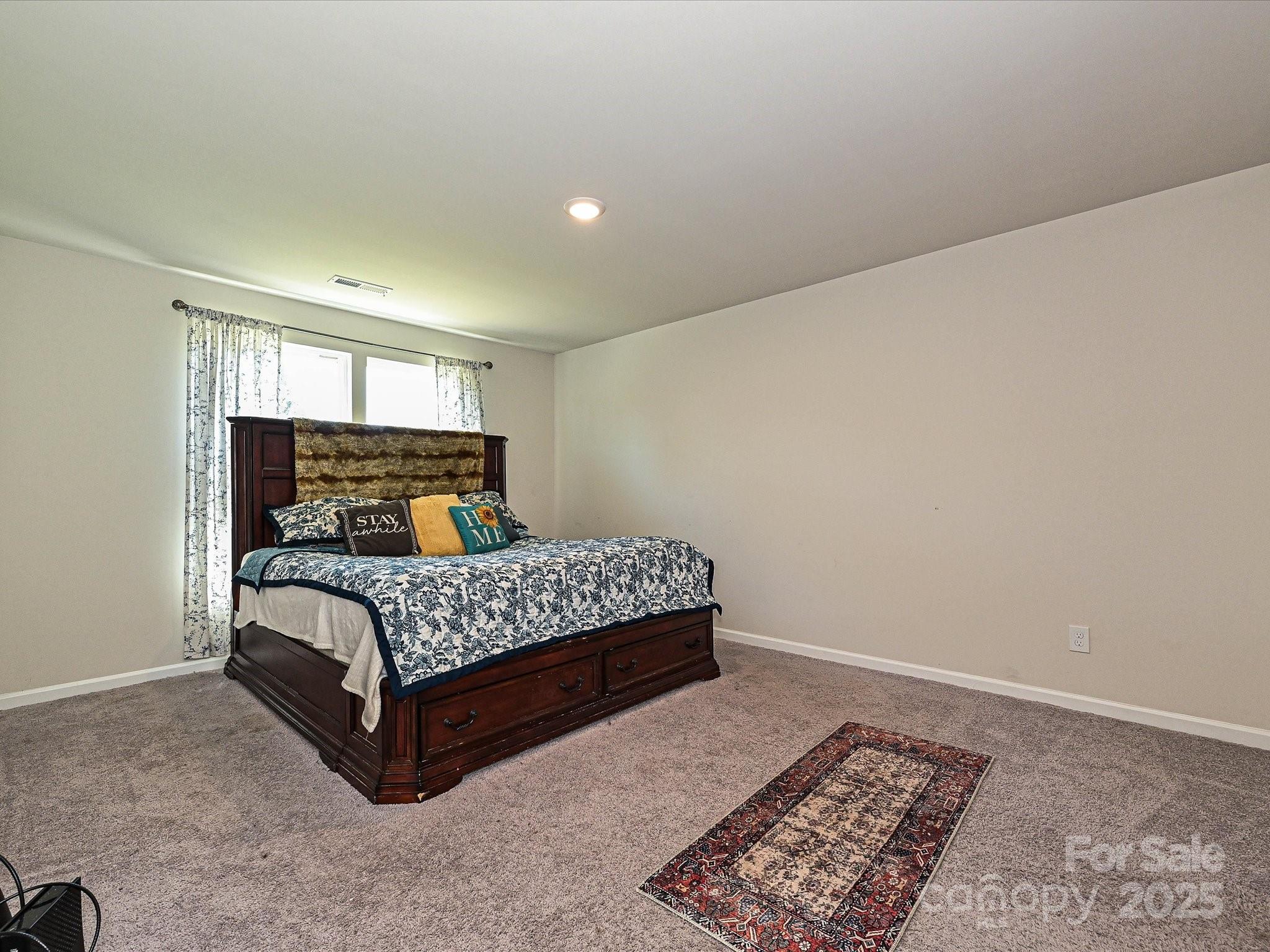 323-j C J C Dellinger Road Cherryville, NC 28021 - Photo 13 of 29 a bedroom with a bed rug and window