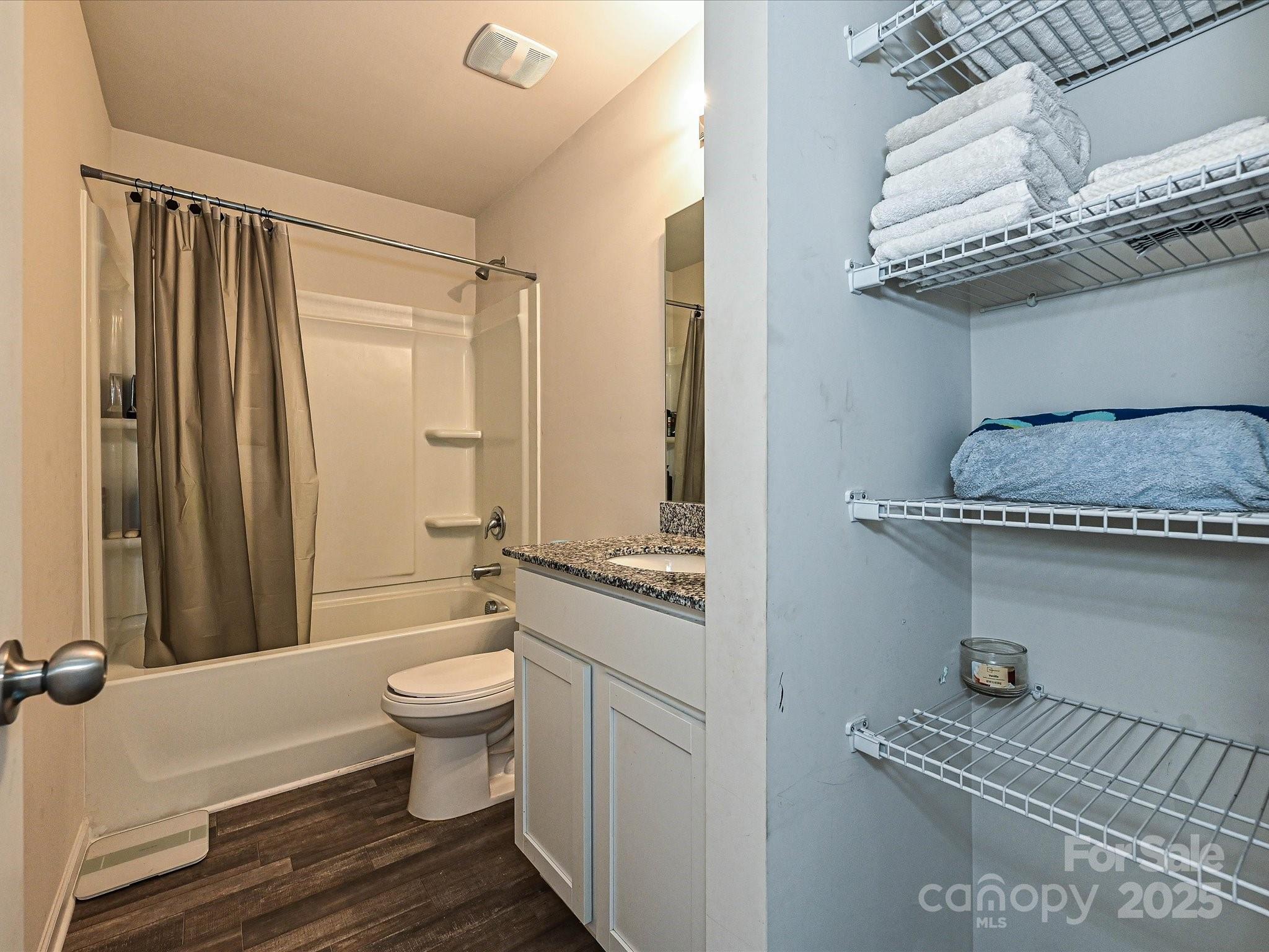323-j C J C Dellinger Road Cherryville, NC 28021 - Photo 18 of 29 a bathroom with a granite countertop sink a toilet and shower