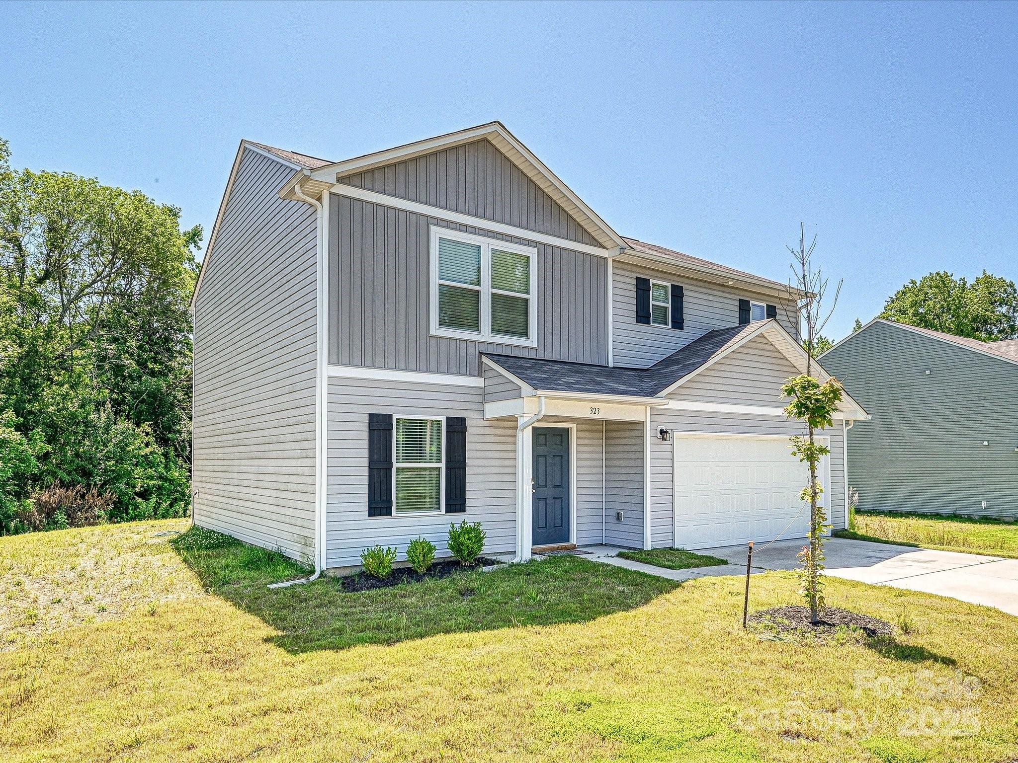 323-j C J C Dellinger Road Cherryville, NC 28021 - Photo 21 of 29 a house view with a backyard space