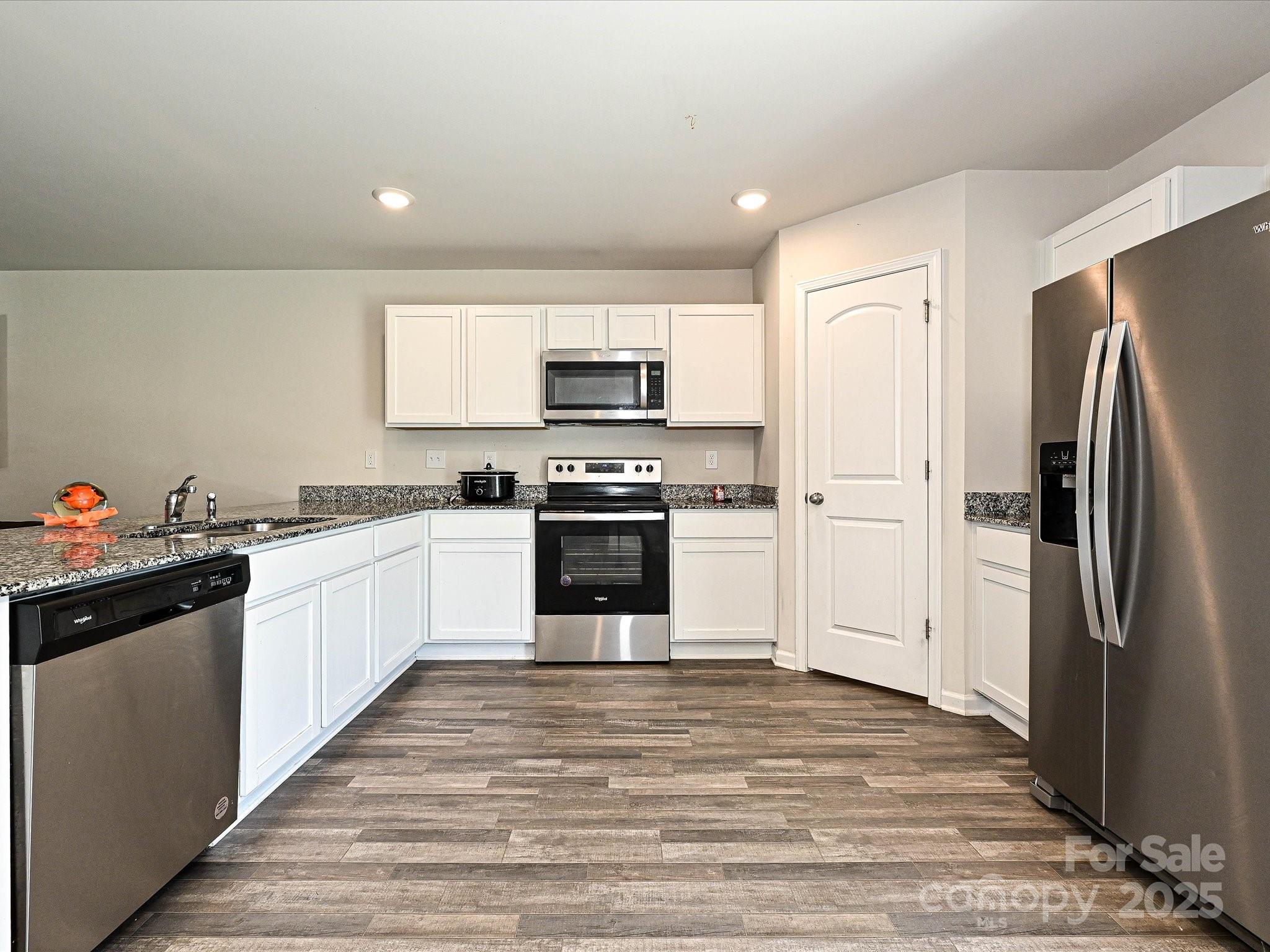 323-j C J C Dellinger Road Cherryville, NC 28021 - Photo 3 of 29 a kitchen with granite countertop a refrigerator stove top oven and sink