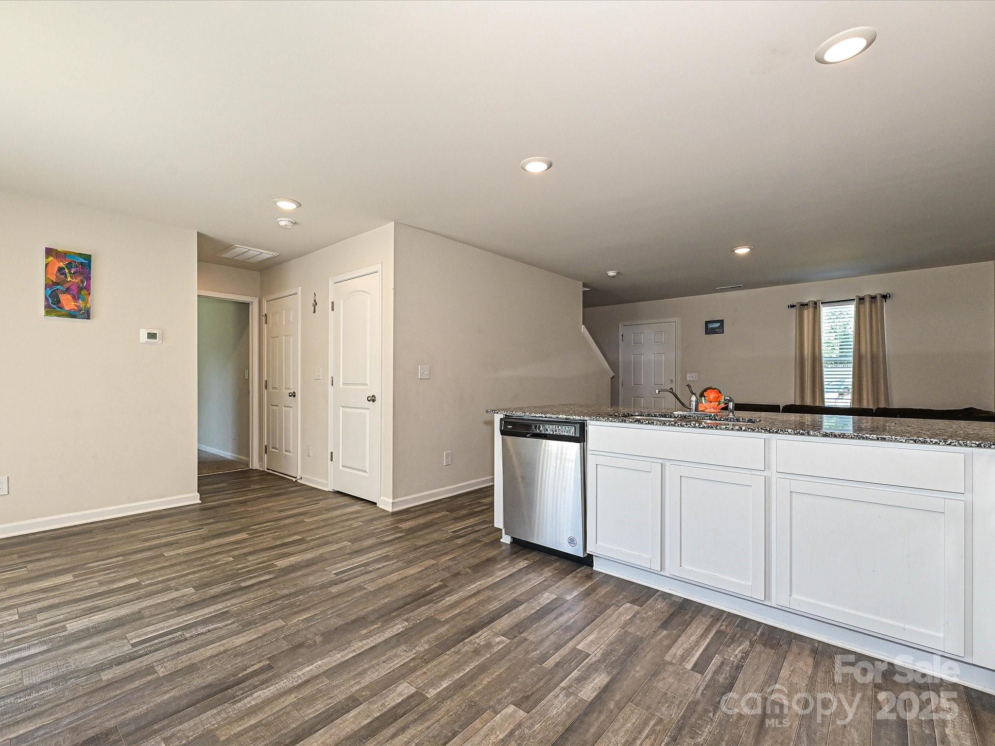 323-j C J C Dellinger Road Cherryville, NC 28021 - Photo 6 of 29 a kitchen with granite countertop white cabinets and white appliances