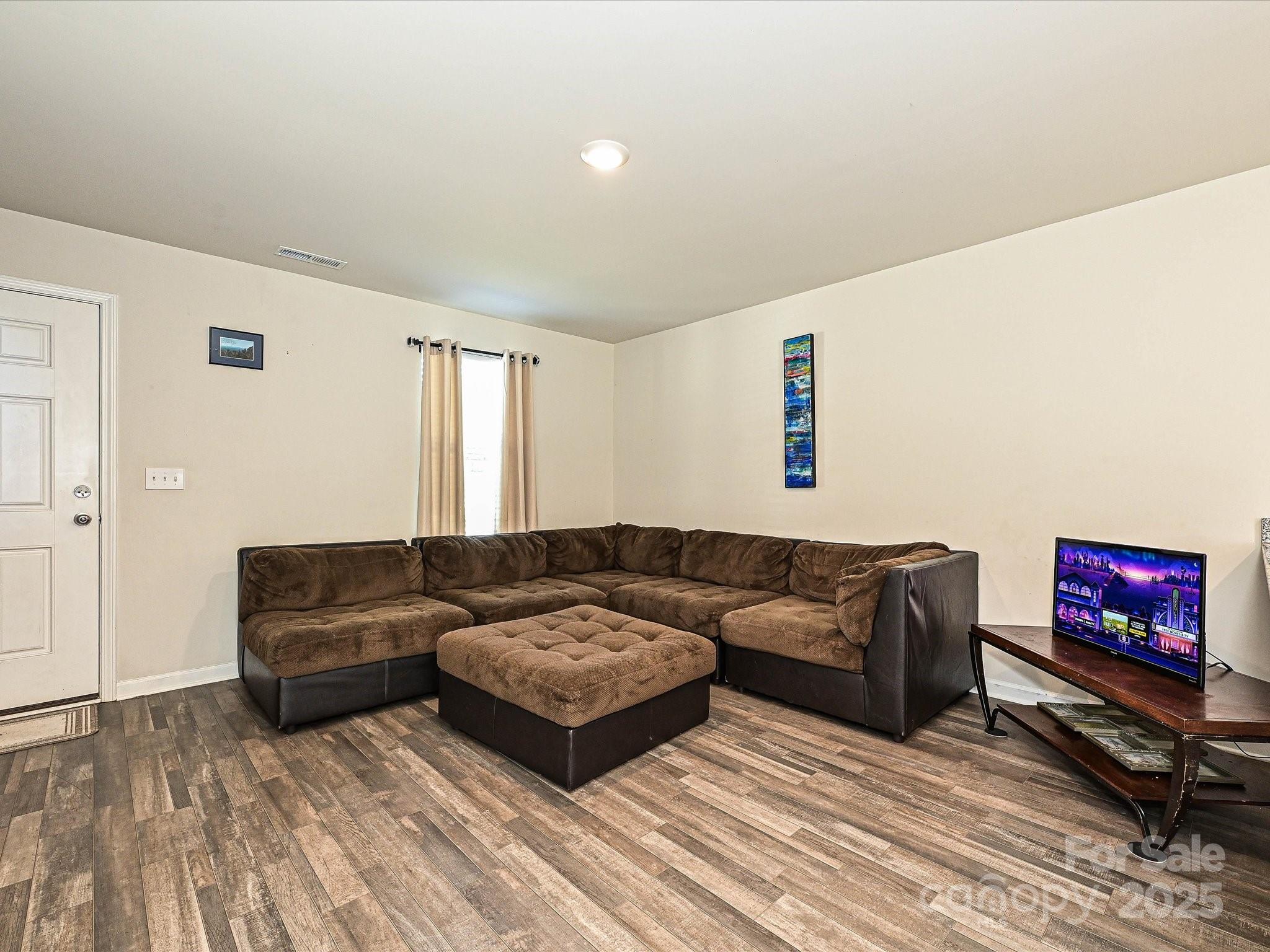323-j C J C Dellinger Road Cherryville, NC 28021 - Photo 9 of 29 a living room with furniture and a flat screen tv