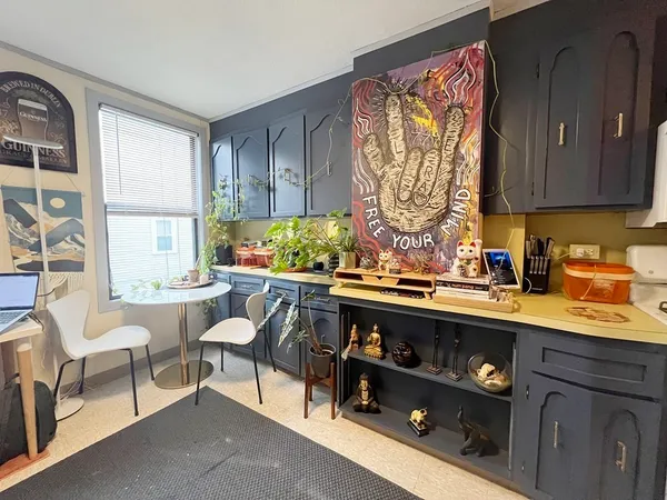 a kitchen with stainless steel appliances granite countertop a sink and cabinets