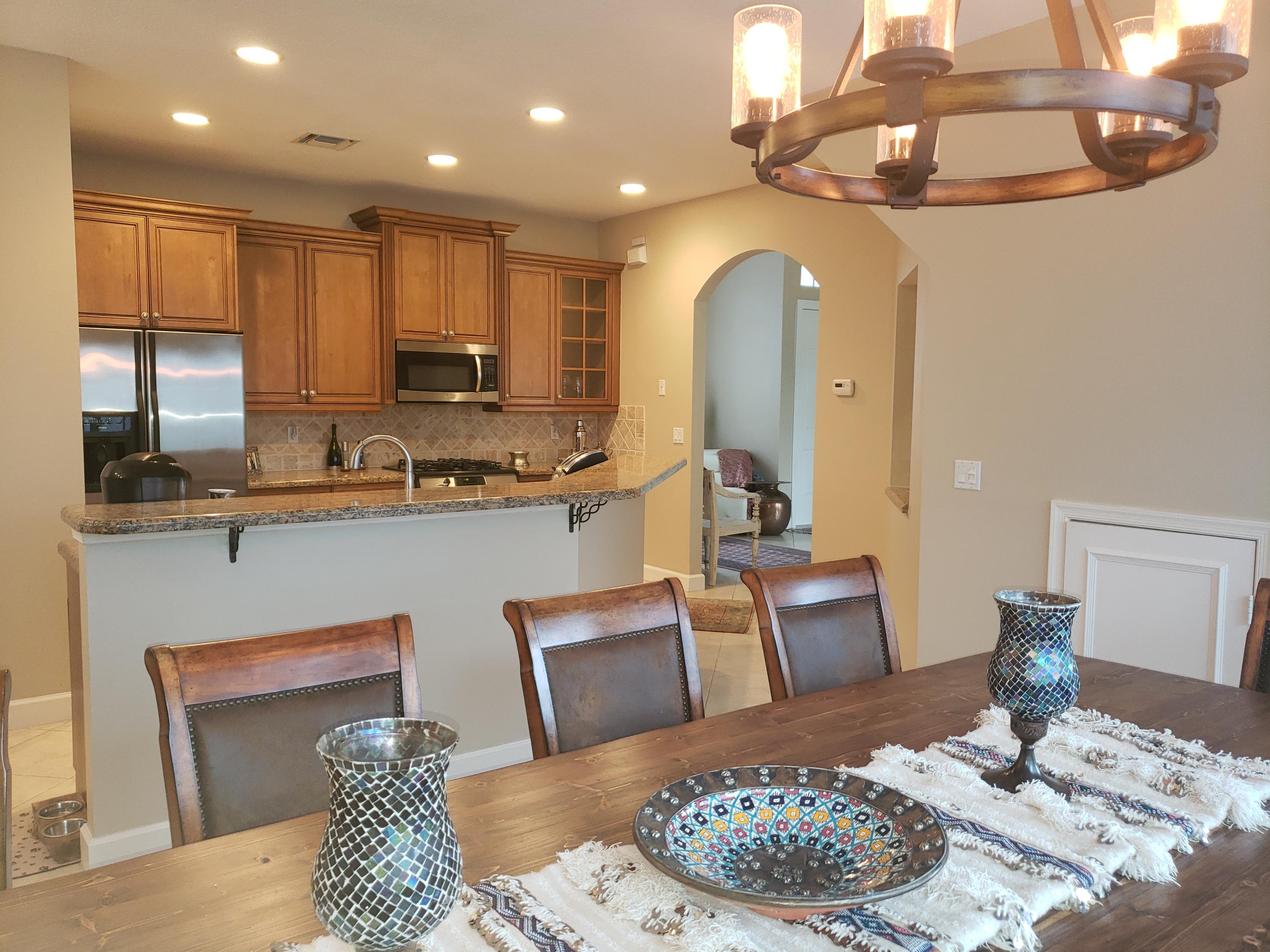 610 Scrubjay Drive Jupiter, FL 33458 - Photo 11 of 29 92ff999bf6be-dining_kitchen1