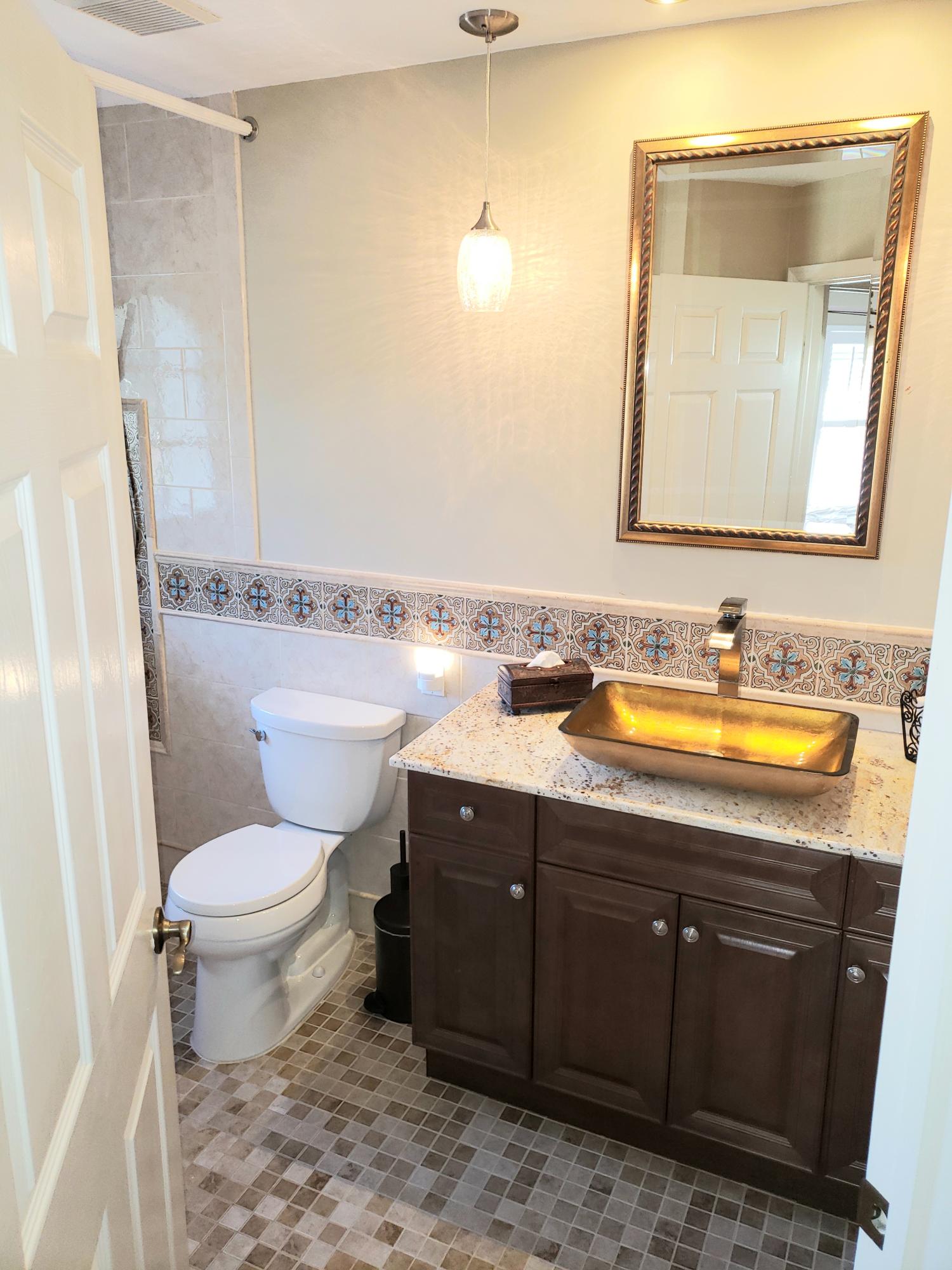 610 Scrubjay Drive Jupiter, FL 33458 - Photo 24 of 29 afcce663a51d-upstairs_bath1