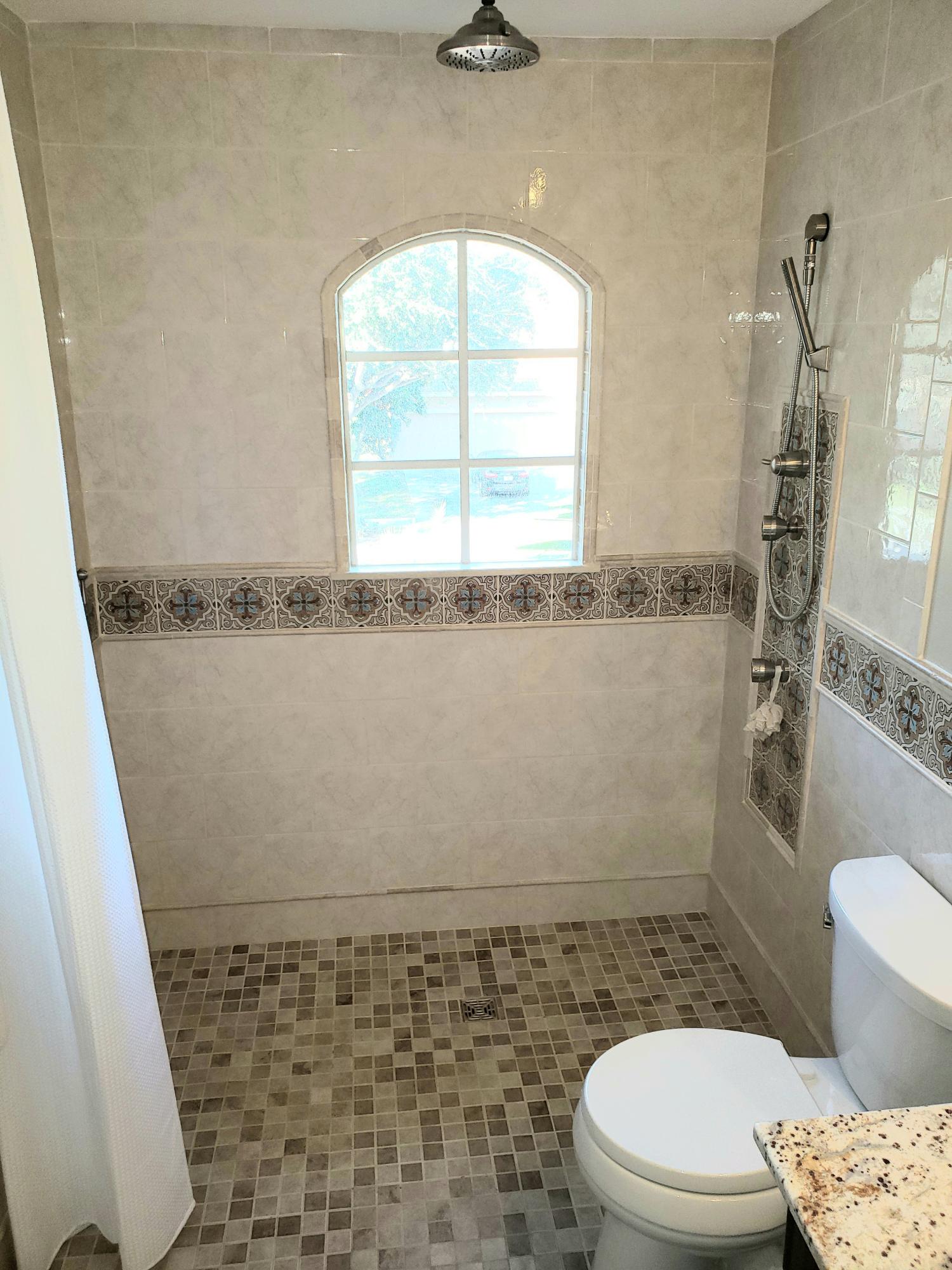 610 Scrubjay Drive Jupiter, FL 33458 - Photo 25 of 29 a7733c7a6c0e-upstairs_bath3