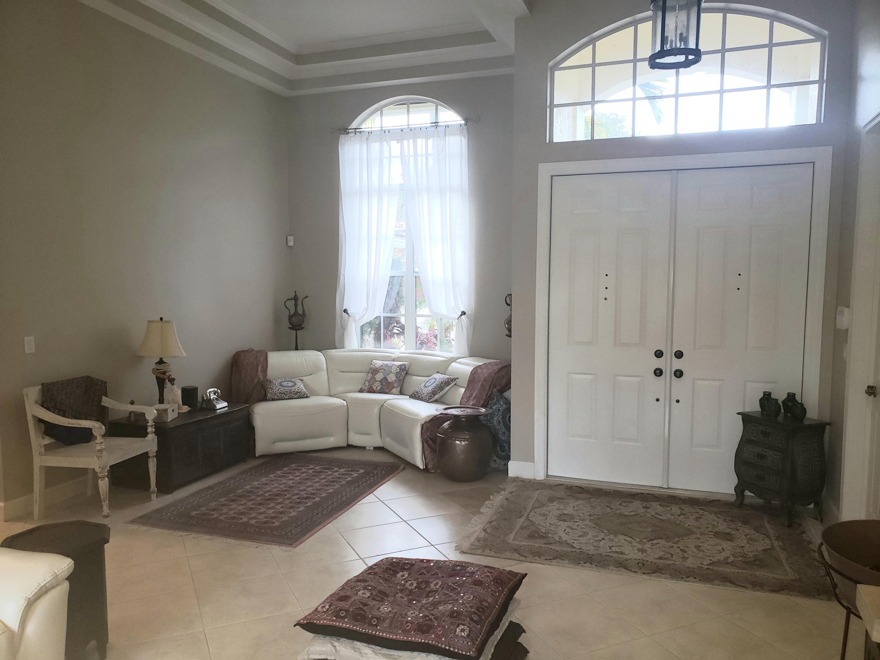 610 Scrubjay Drive Jupiter, FL 33458 - Photo 5 of 29 925b607c50b4-living_room3