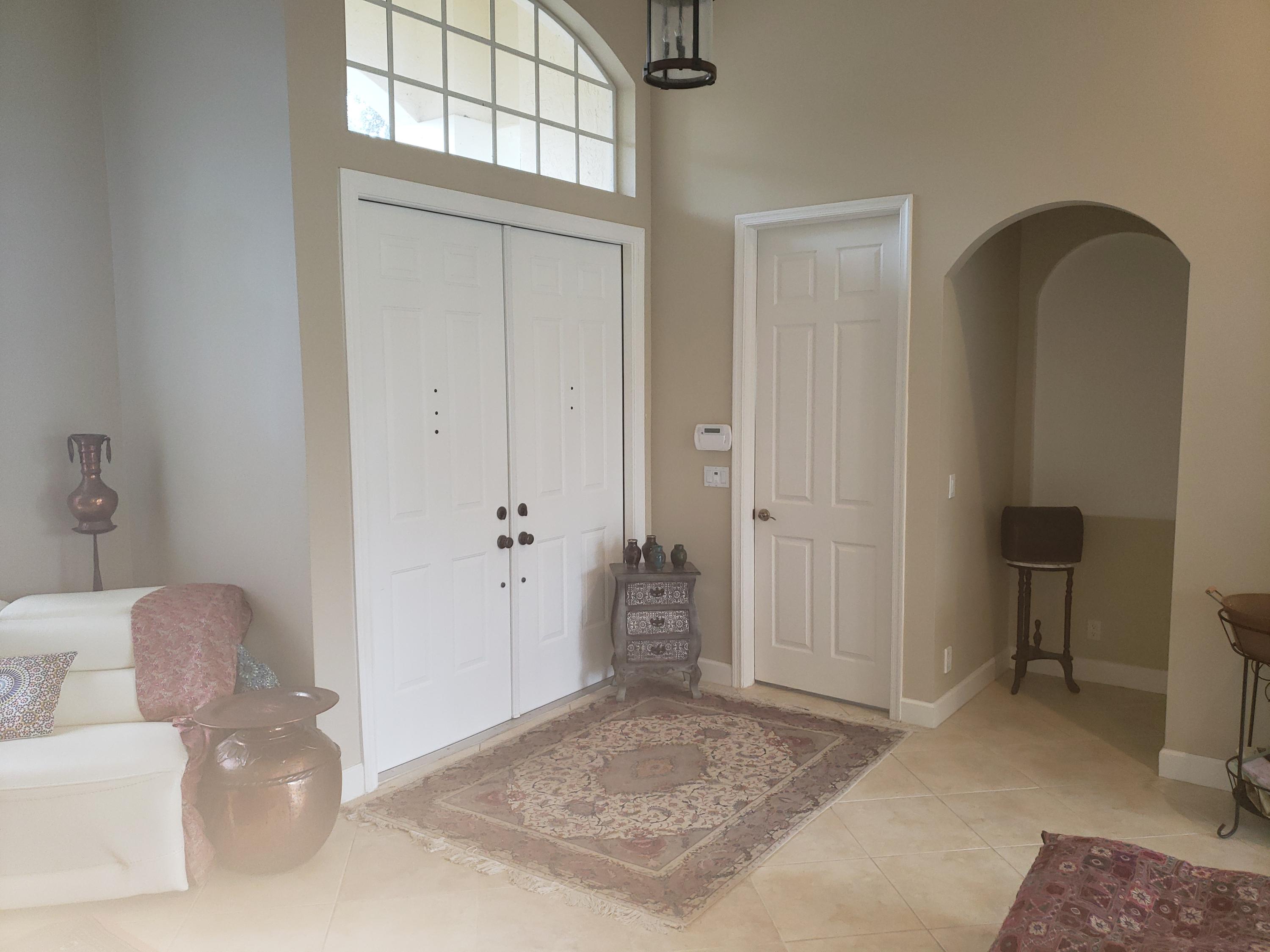 610 Scrubjay Drive Jupiter, FL 33458 - Photo 6 of 29 514db2e1d737-foyer