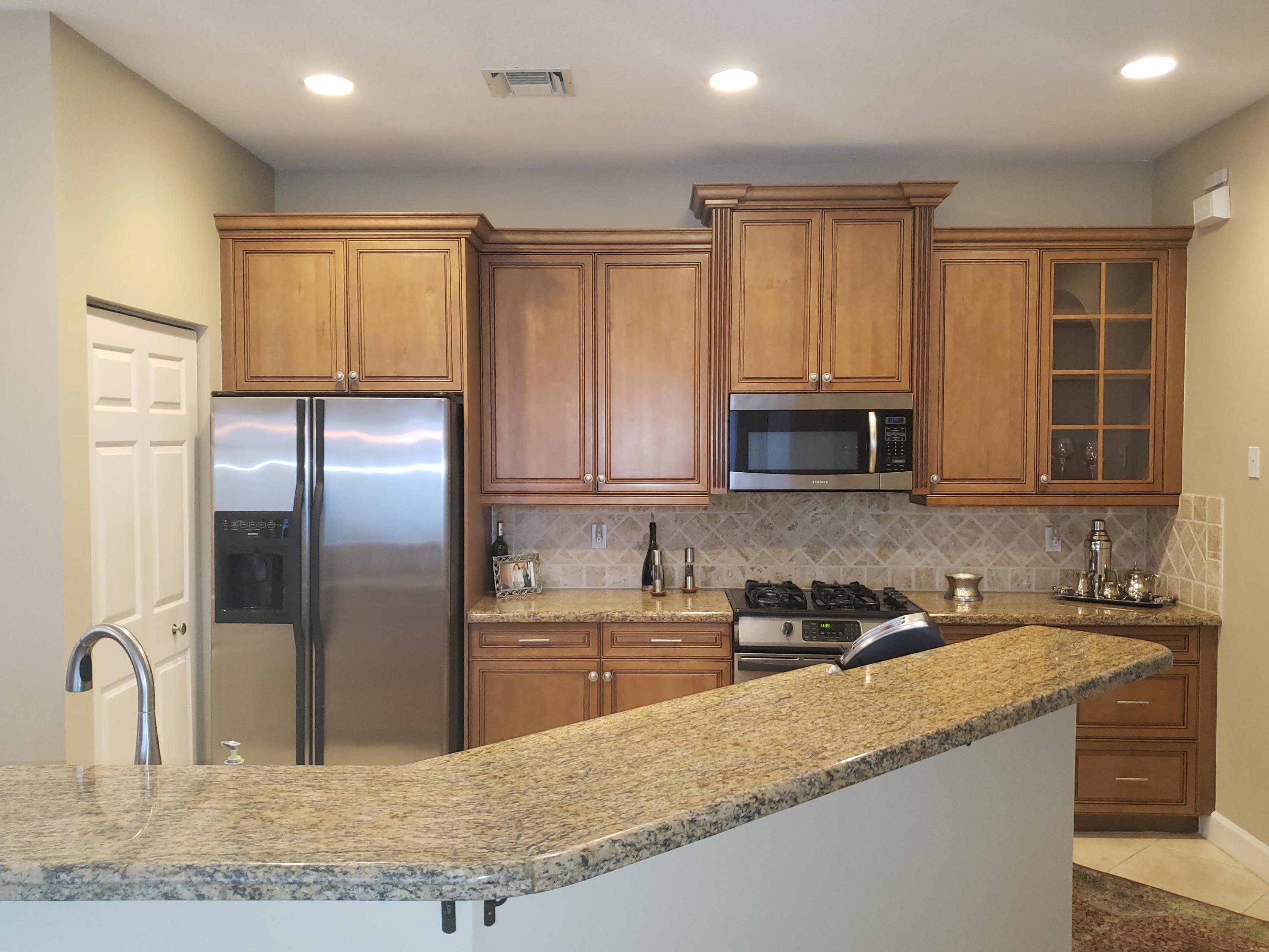 610 Scrubjay Drive Jupiter, FL 33458 - Photo 8 of 29 9301530fbb92-Kitchen