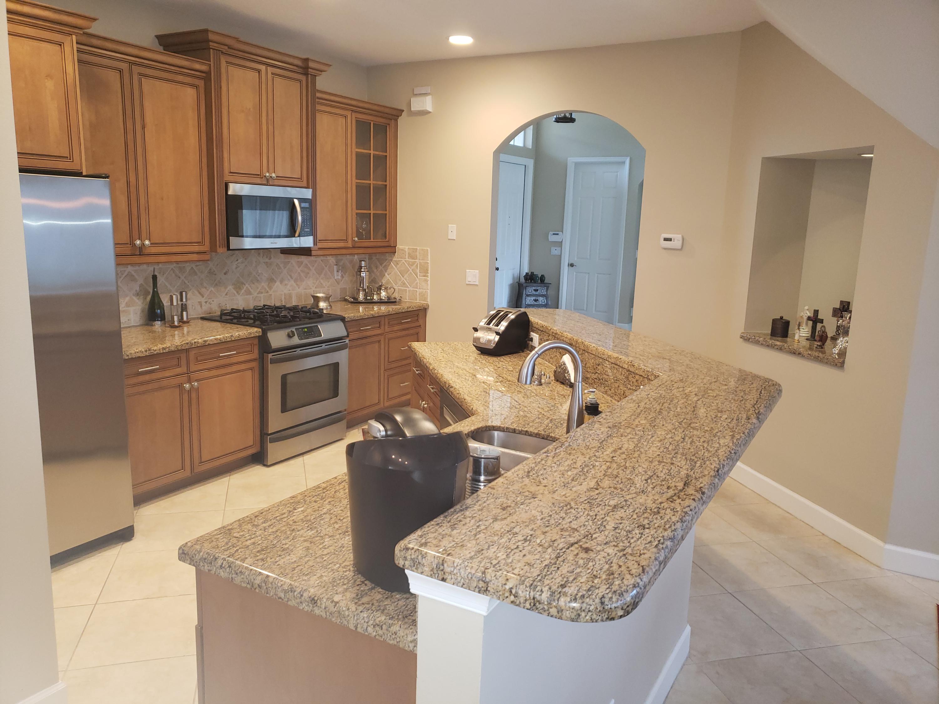 610 Scrubjay Drive Jupiter, FL 33458 - Photo 9 of 29 aa3dcceaf461-kitchen2