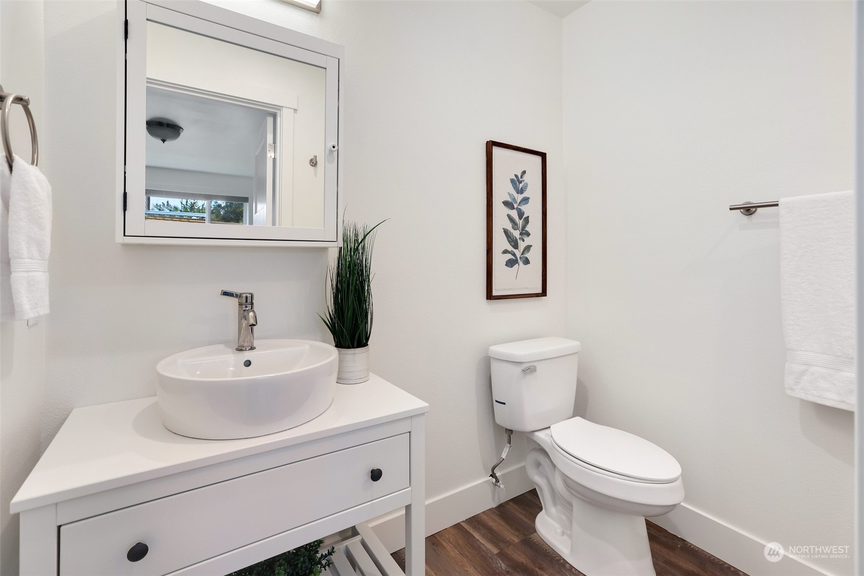 4114 Northeast 22nd Place Renton, WA 98059 - Photo 20 of 28 a bathroom with a sink mirror and a toilet