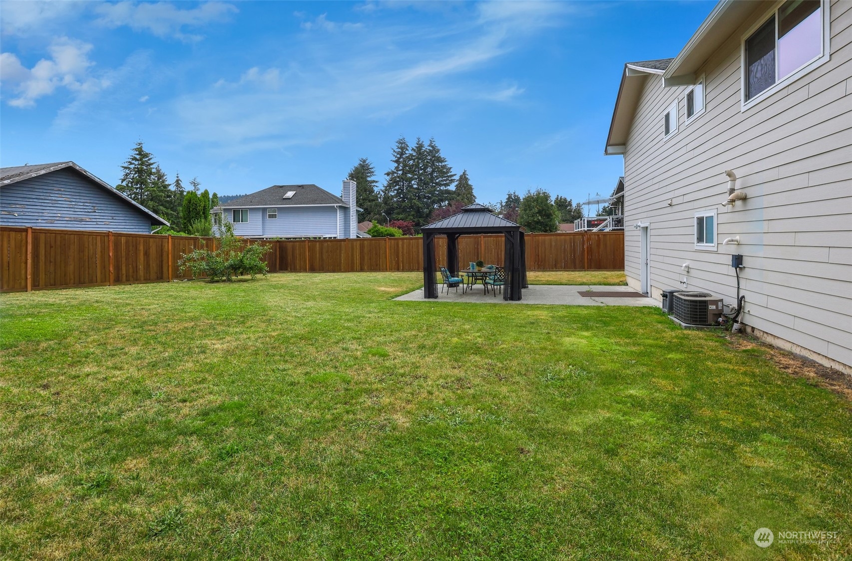 4114 Northeast 22nd Place Renton, WA 98059 - Photo 24 of 28 a house view with a garden space