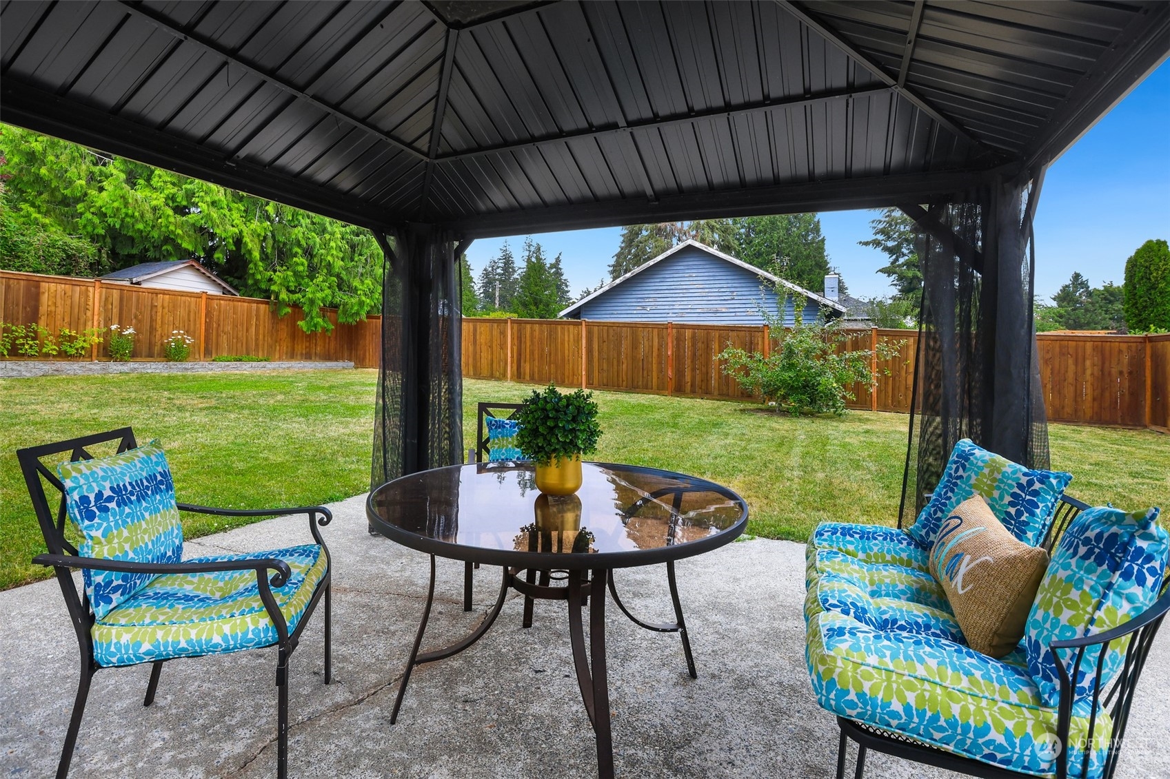 4114 Northeast 22nd Place Renton, WA 98059 - Photo 26 of 28 a view of an outdoor sitting area with furniture and backyard
