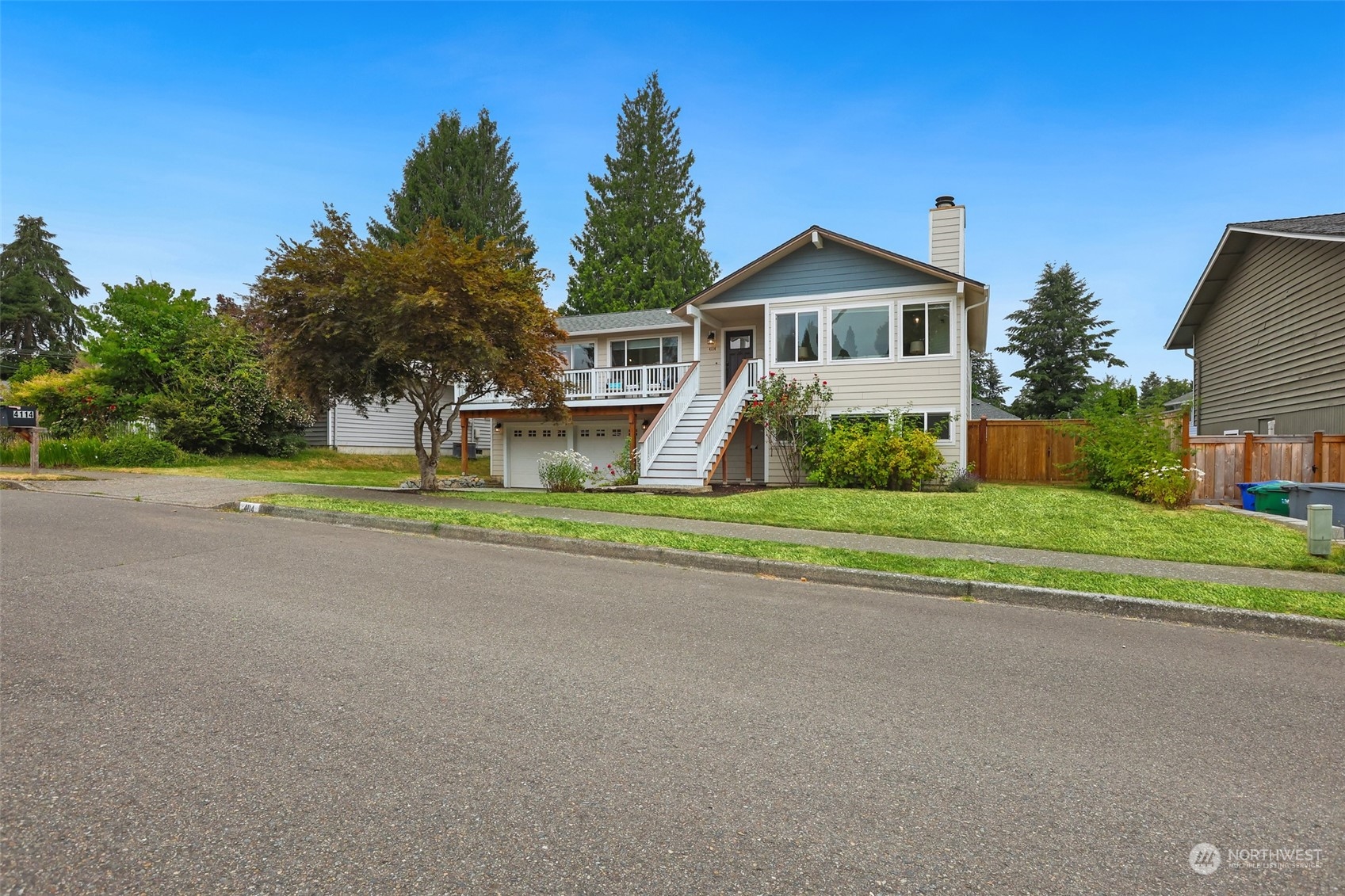 4114 Northeast 22nd Place Renton, WA 98059 - Photo 28 of 28 a front view of house with yard and green space