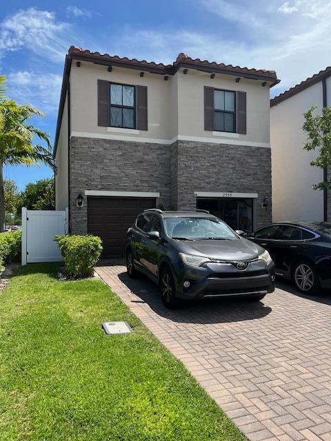 2999 Butternut Lane Riviera Beach, FL 33410 - Photo 2 of 52 Front